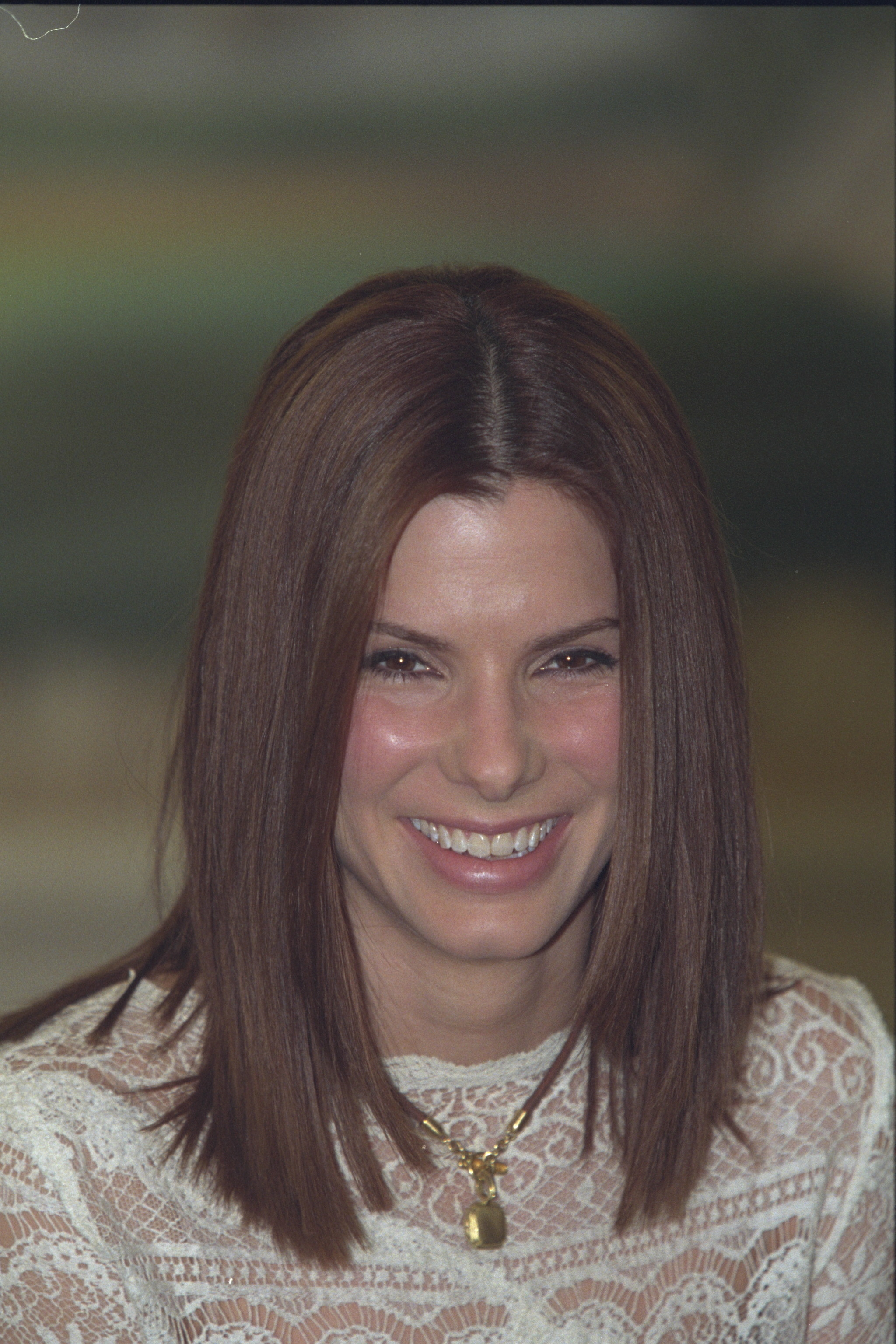 Bullock entered the 2000s with sleek brunette hair and the expressive smile that remained central to her public image. Photographs from this era are now being revisited as fans debate her newest appearance. | Source: Getty Images