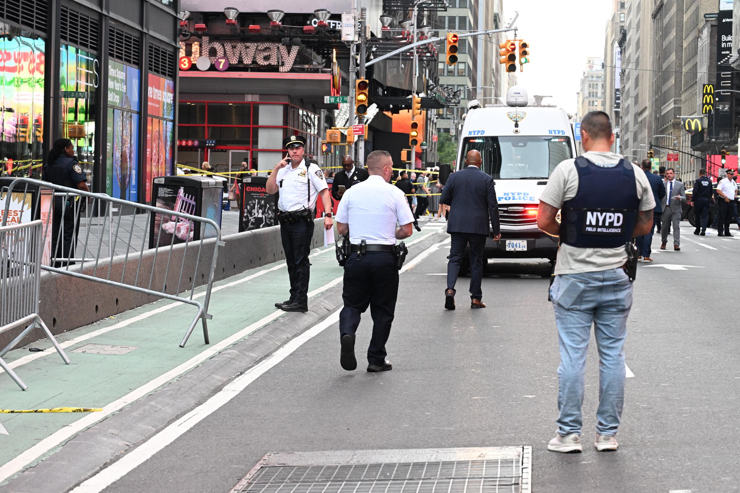 New York Police Department officers investigated the scene after police shot and wounded an armed suspect near West 42nd Street and Seventh Avenue in Times Square on August 31, 2026, in New York, New York.