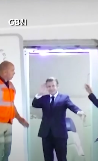 Emmanuel Macron waving to the press gathered on the tarmac. | Source: YouTube/GBNews
