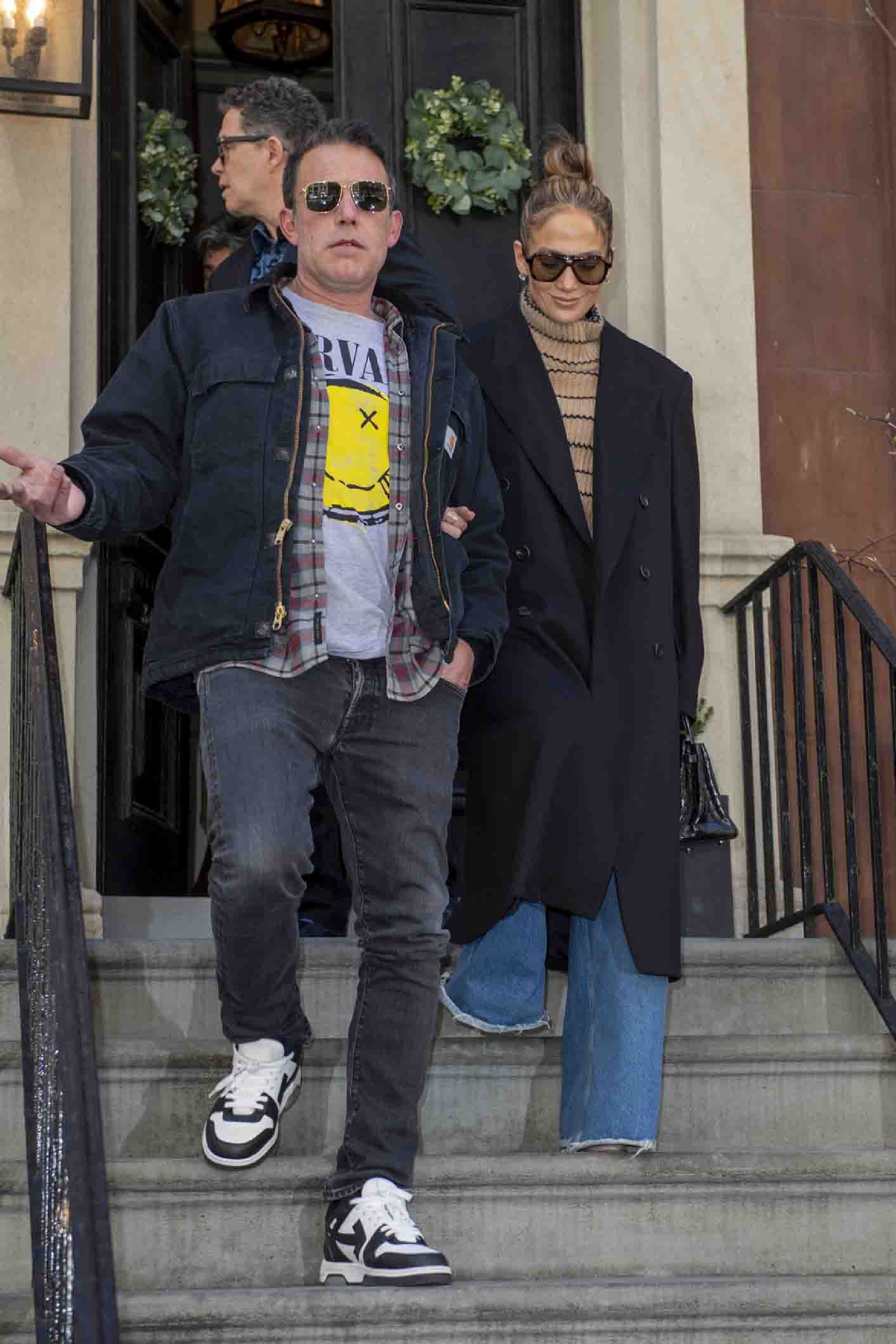 Jennifer Lopez and Ben Affleck are seen leaving a building together in New York City on March 30, 2024. Lopez recently reflected on her divorce during the "SmartLess" podcast, describing it as a turning point that prompted her to focus on personal growth. | Source: Getty Images