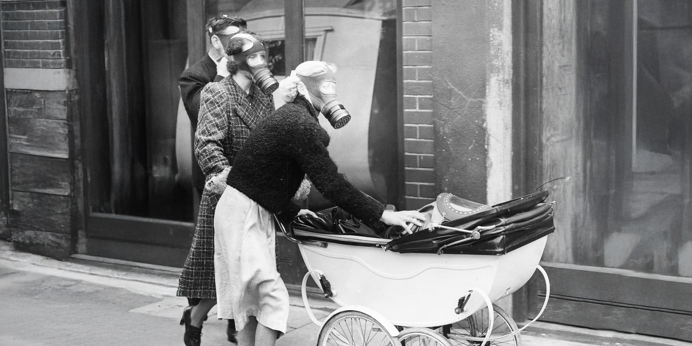 Women in gas masks during a 1940s air raid drill | Source: Getty Images
