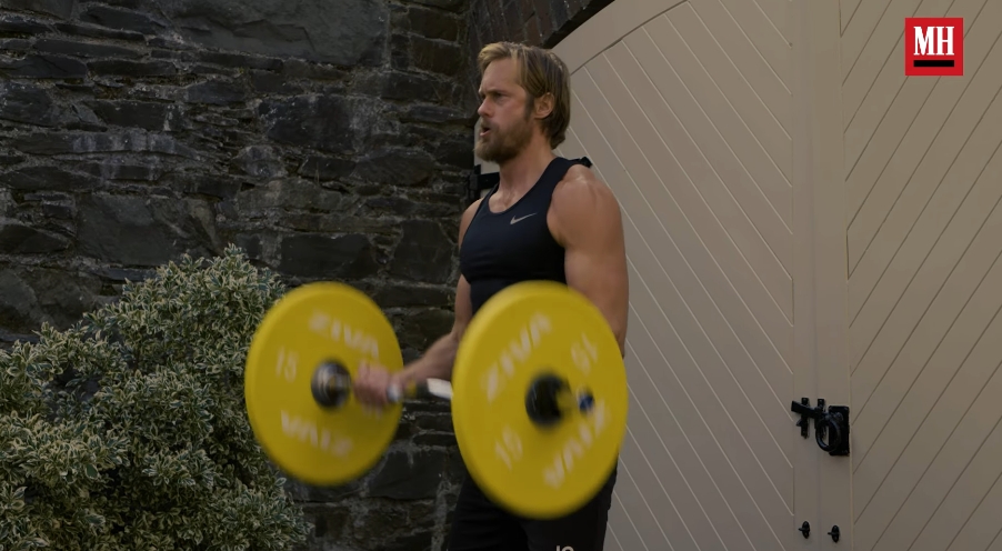 Alexander Skarsgård powered through a barbell exercise during the intense training behind his muscular transformation for "The Northman." The footage appeared in a video dated April 21, 2022. | Source: YouTube/Men's Health
