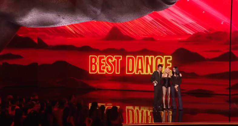 Madonna stood onstage with Charli XCX and Troye Sivan during the Best Dance segment at the 2026 MTV VMAs. The moment came as Madonna accepted the award for "Confessions II: The Film." | Source: Instagram/vmas
