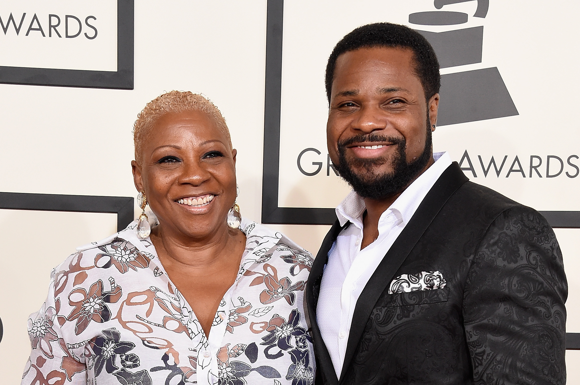 Malcolm-Jamal Warner's widow sued his mother. At this event, he and Pamela Warner attended the "57th Annual GRAMMY Awards" at the STAPLES Center on February 8, 2015, in Los Angeles, California. | Source: Getty Images