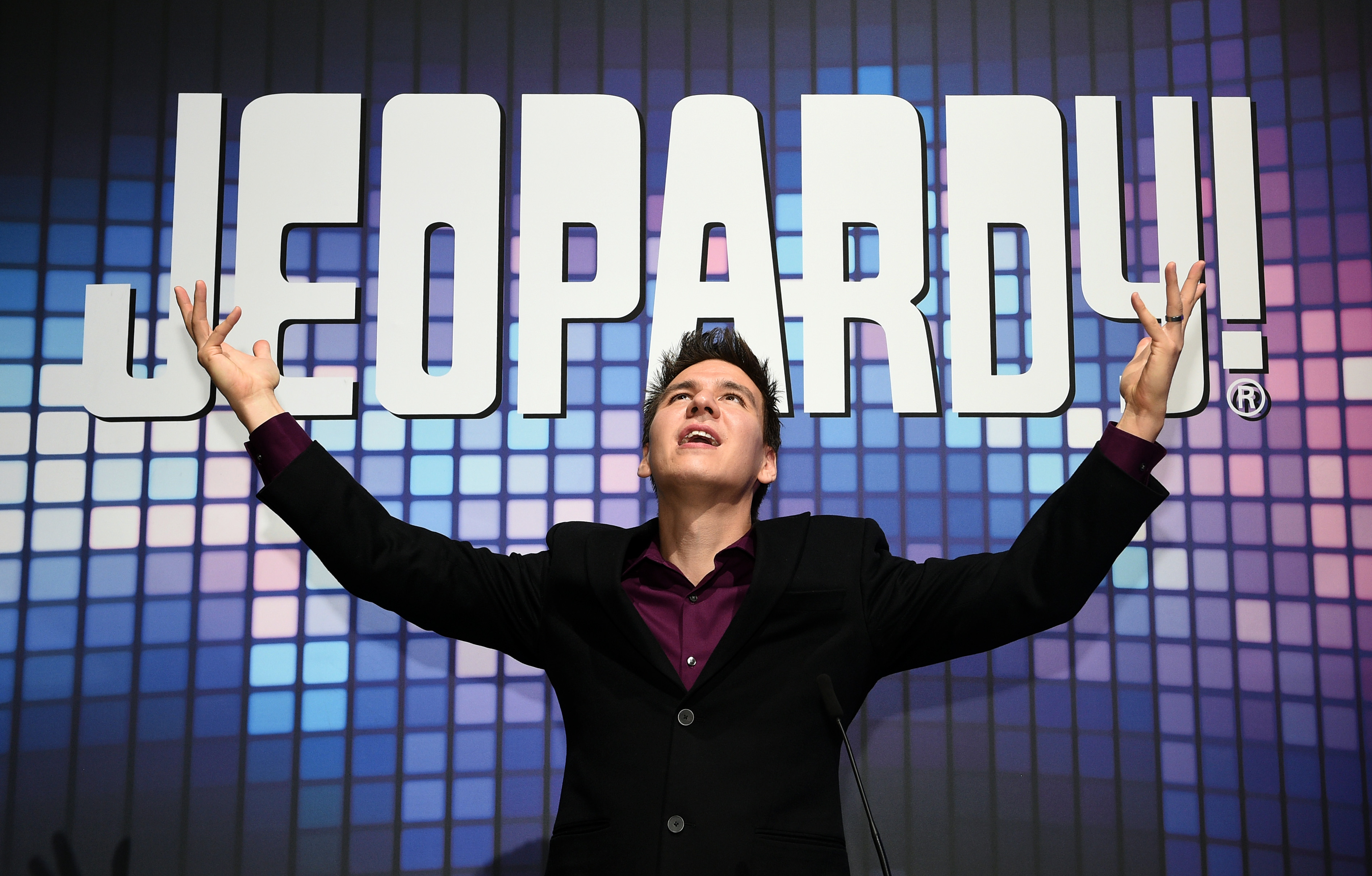 James Holzhauer poses at the IGT booth during the launch of two "Jeopardy!" slot machines at the Global Gaming Expo in Las Vegas on October 15, 2019 | Photo: Getty Images