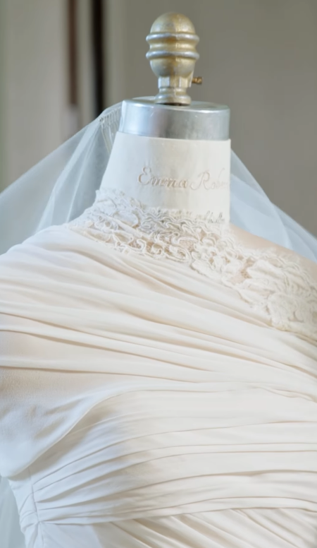 A closer look highlights the intricate draping, lace detailing, and veil on Emma Roberts' custom Monique Lhuillier wedding gown. The finished design reflected the vintage-inspired look Roberts envisioned for her wedding day. | Source: Instagram/moniquelhuillier