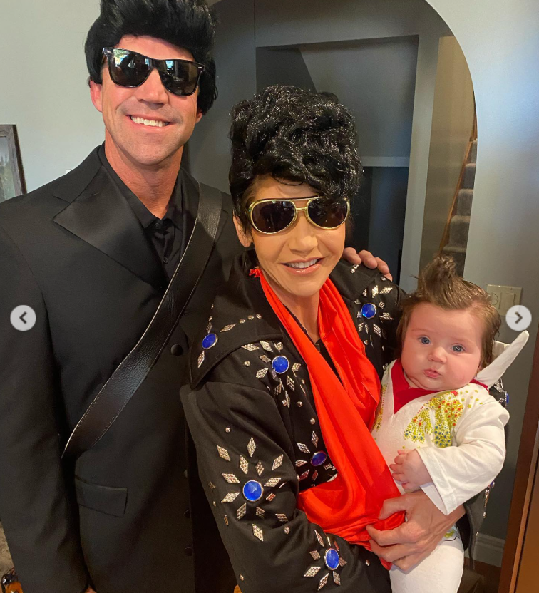 Close and charismatic, Bryon Noem leans into his Johnny Cash look while Kristi Noem, Elvis-inspired, cradles their little one—small but unmistakably the star. | Source: Instagram/sdbryonnoem