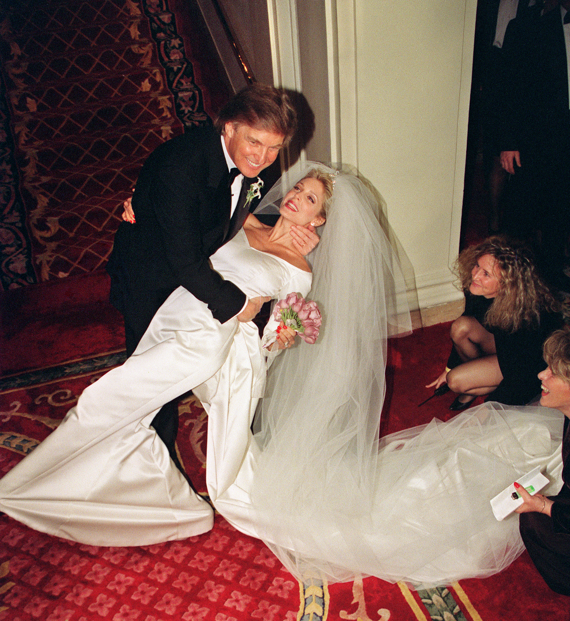 Donald Trump and Marla Maples had a complicated prenuptial agreement when they married. In this photo, he dipped his new bride after their wedding at the Plaza Hotel on December 20, 1993, in New York City, New York. | Source: Getty Images