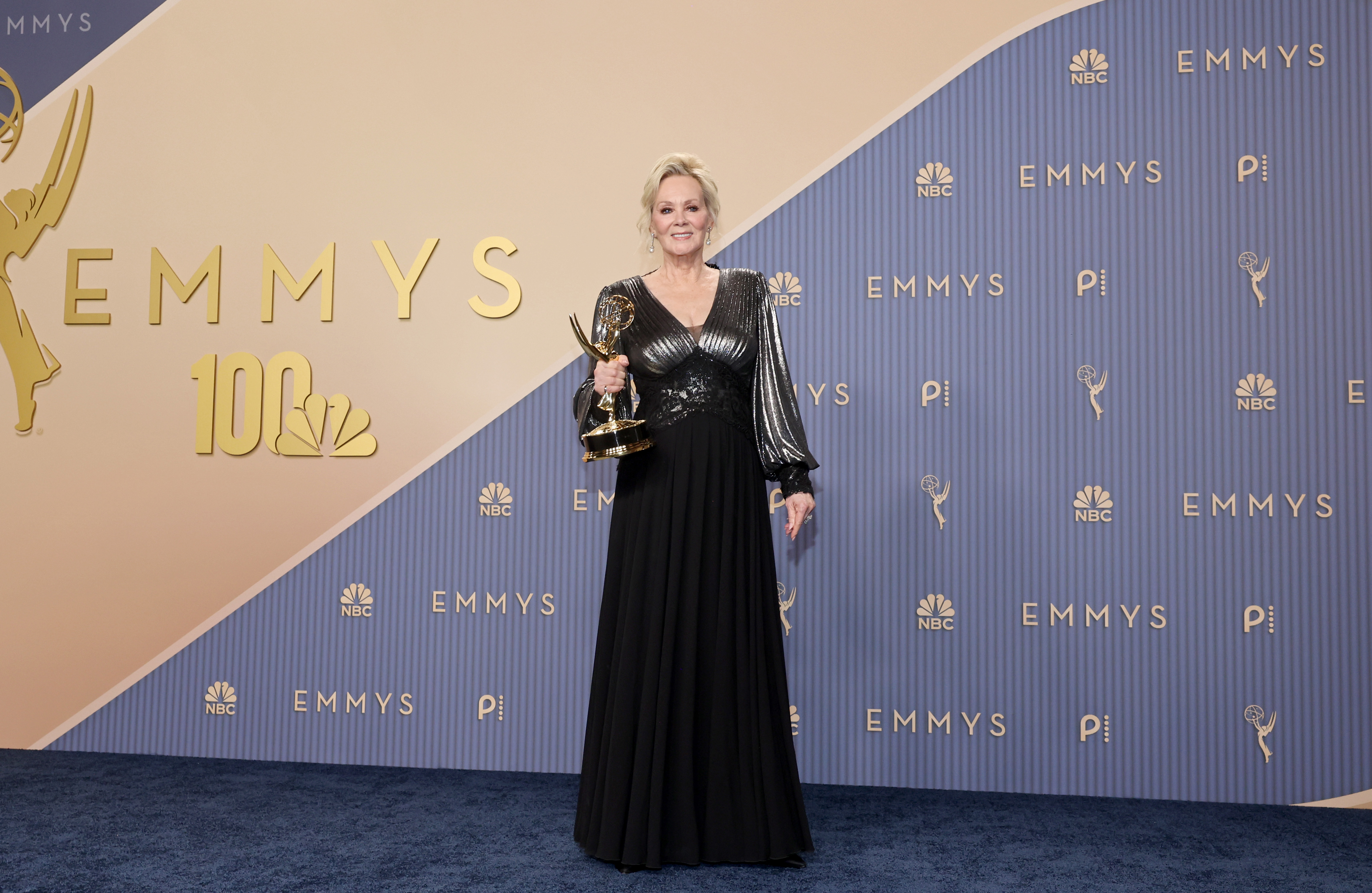 Jean Smart poses with her Emmy for Outstanding Lead Actress in a Comedy Series for Hacks at the 78th Annual Primetime Emmy Awards. | Source: Getty Images