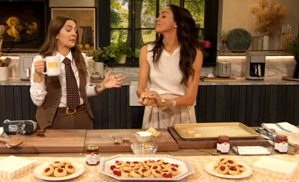Meghan appeared alongside Drew Barrymore in March 2025 as she opened up about the little ways Archie and Lilibet sometimes echo their father's British speech. Her comments about their “very American accents” would later take on fresh interest when viewers listened closely to Archie's voice in the family's first U.K. video. | Source: YouTube/ The Drew Barrymore Show