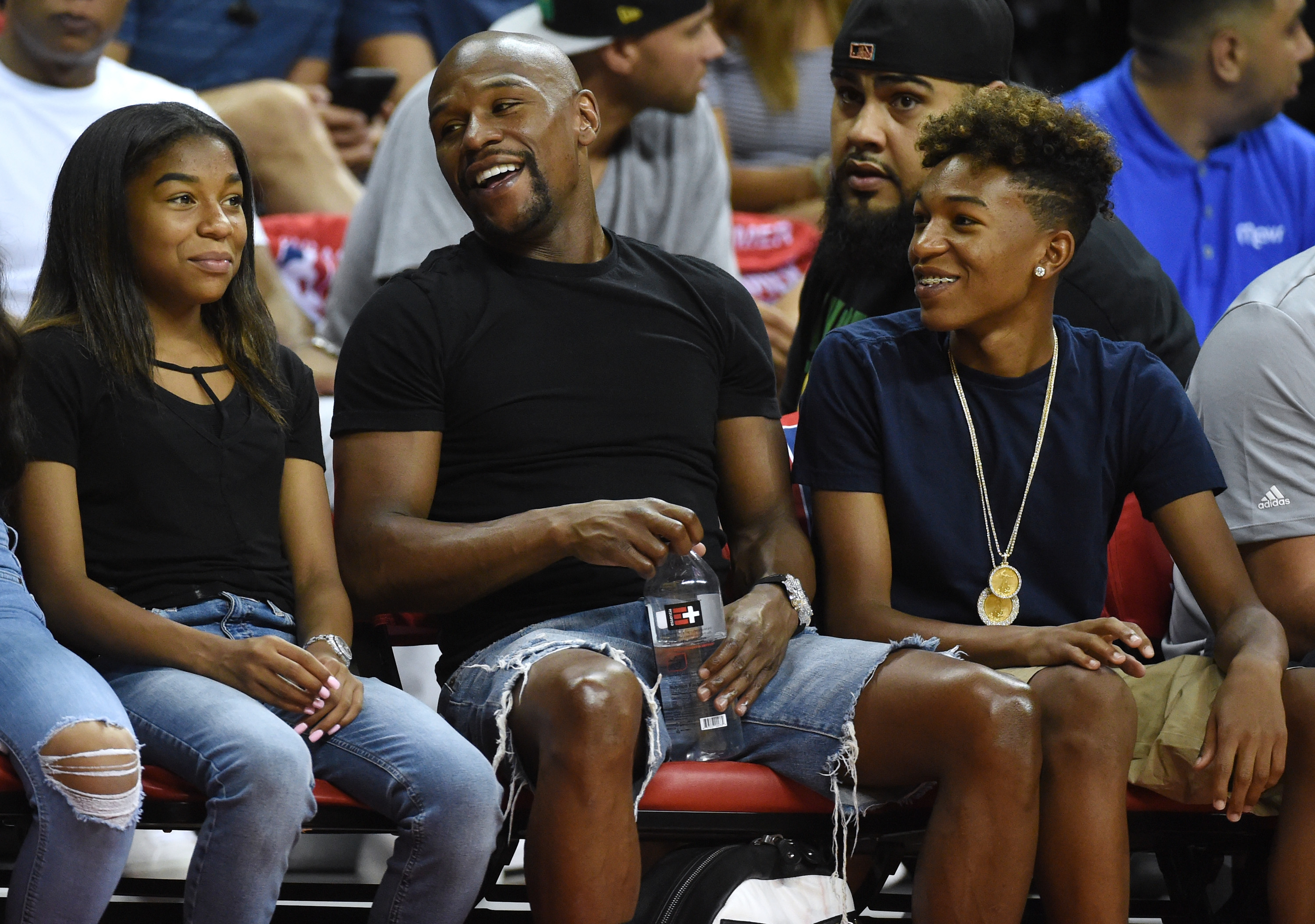 Floyd Mayweather, Jr., his daughter Jirah and his son Koraun attend a Summer League game between the Boston Celtics and the Los Angeles Lakers on July 8, 2017 | Source: Getty Images