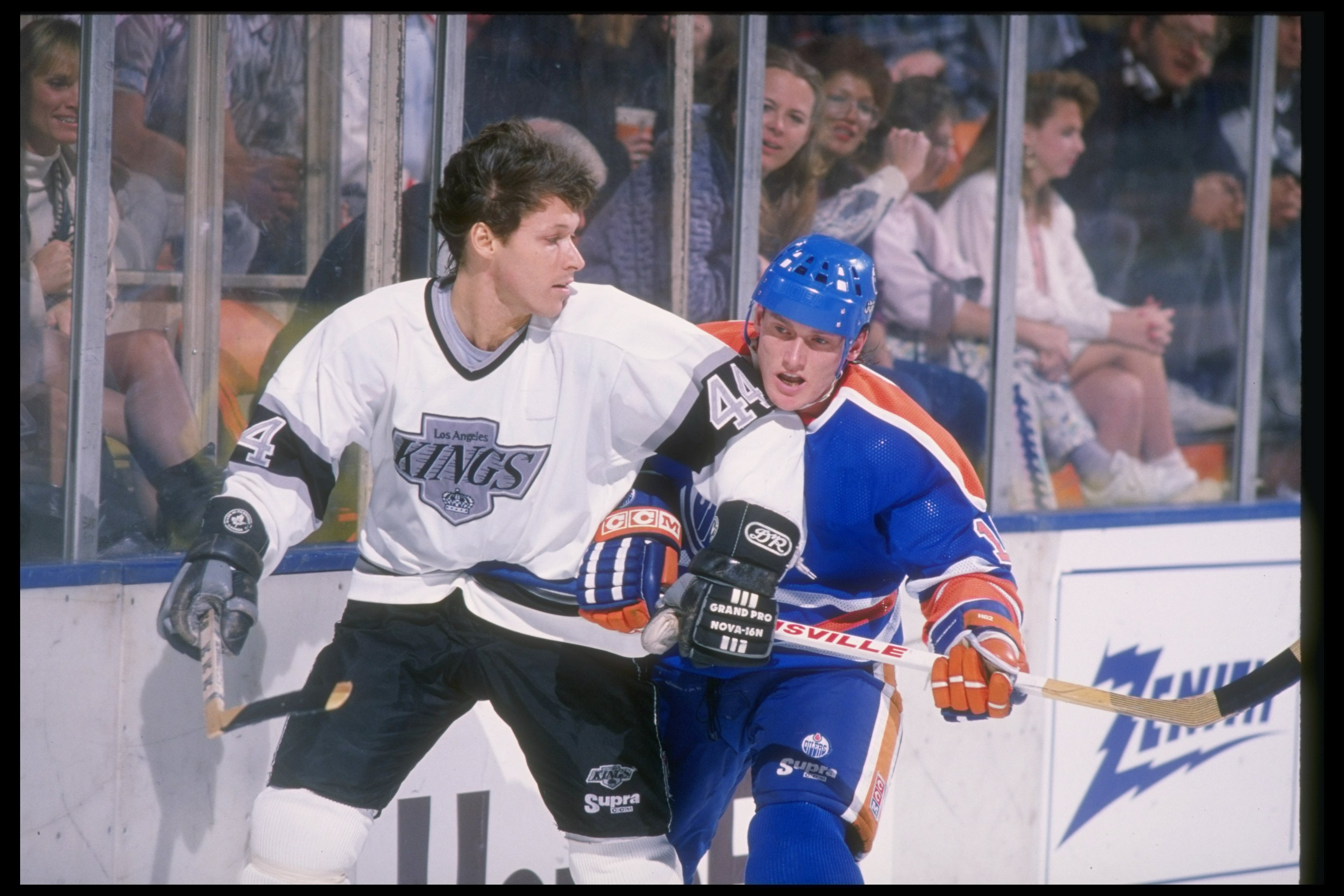 Ron Duguay battles for position against an opposing player while wearing a Los Angeles Kings jersey during the 1988–89 season. The Kings were his final NHL team, bringing his 12-year career in the league to a close. | Source: Getty Images