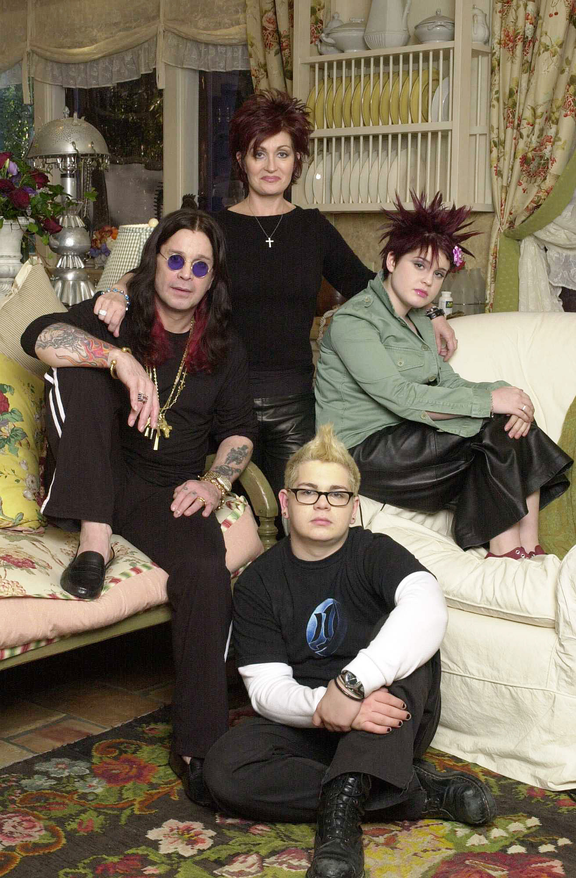 Kelly Osbourne's spiky burgundy hair and Jack's bleached-blond hairstyle capture the siblings' rebellious early-2000s style. Their family's hit reality show ran for four seasons before ending in 2005. | Source: Getty Images