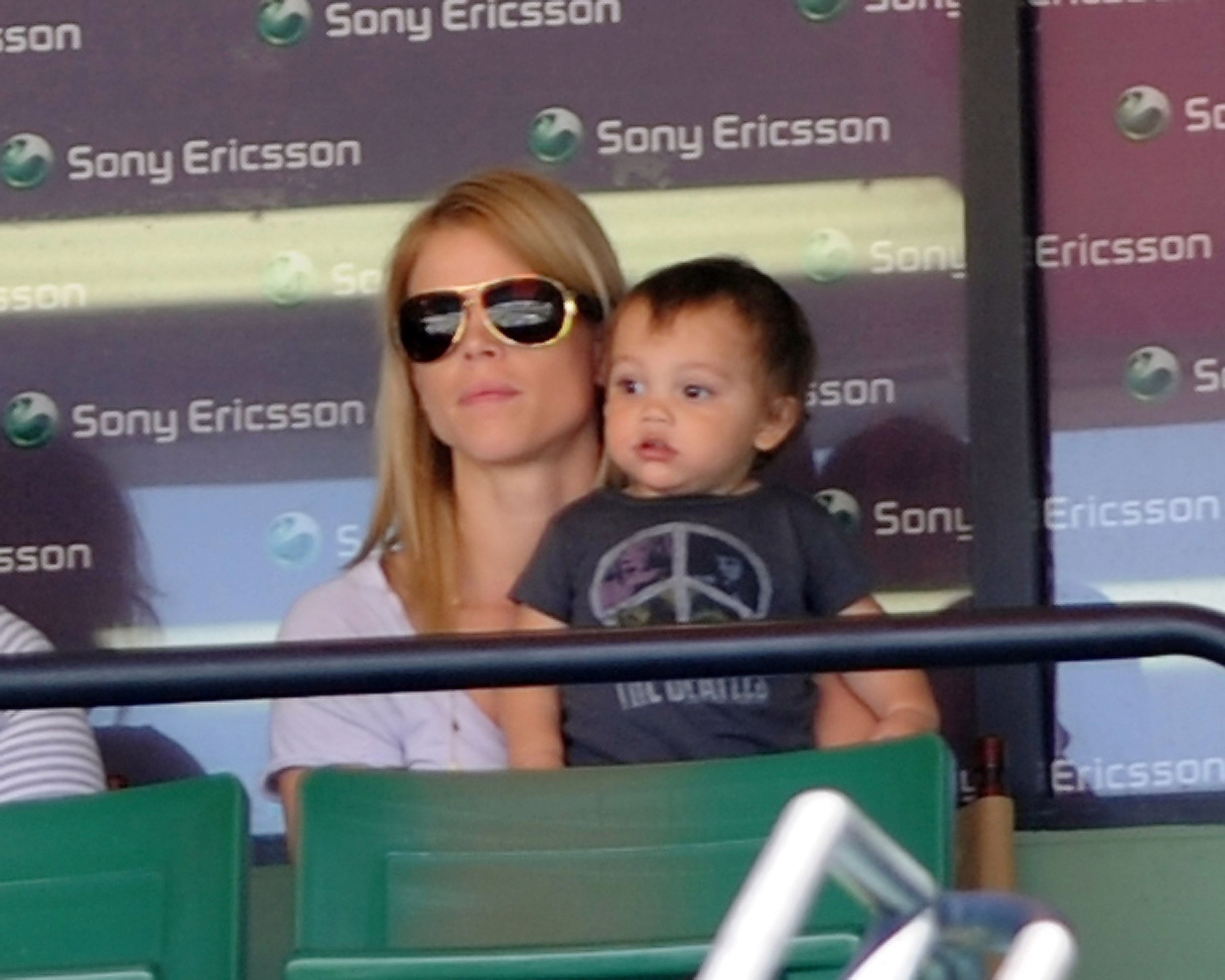 Elin Nordegren and Charlie Woods are seen at the Sony Ericsson Open on April 2, 2010, in Key Biscayne, Florida | Source: Getty Images