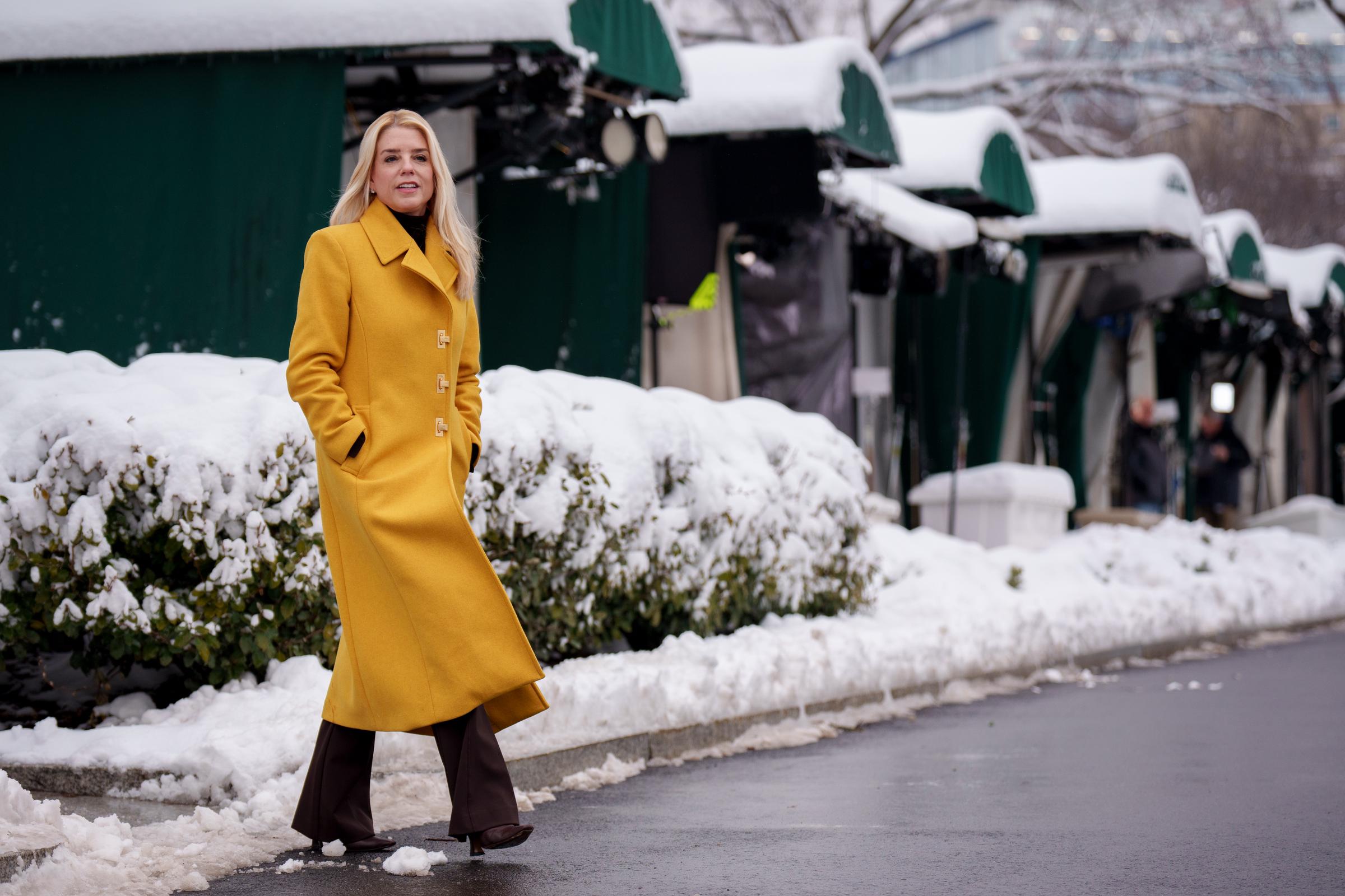 Pam Bondi walks on the White House grounds after an interview in Washington, D.C., on February 12, 2025 | Source: Getty Images