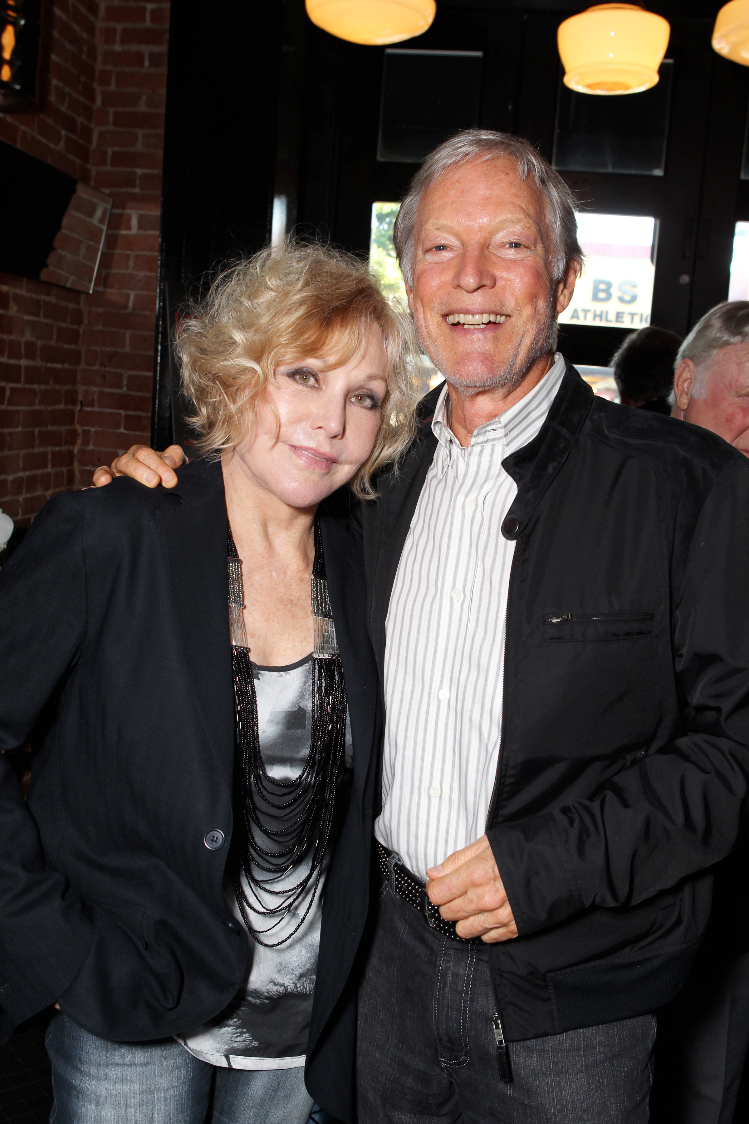 Kim Novak poses with Richard Chamberlain at a tribute to her career hosted by Sony Pictures Home Entertainment and Los Angeles Magazine in Hollywood on July 30, 2010. | Source: Getty Images