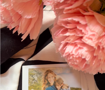 A view of the flowers and a cropped version of the image Sarah Jessica Parker included in her birthday post for her son, posted on October 28, 2025. | Source: Instagram/sarahjessicaparker