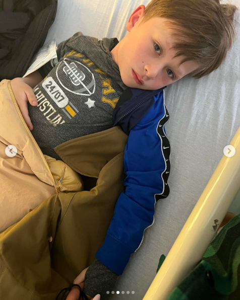 Rafael Baldwin looking at the camera as he lays in a hospital bed, posted on April 28, 2022. | Source: Instagram/hilariabaldwin