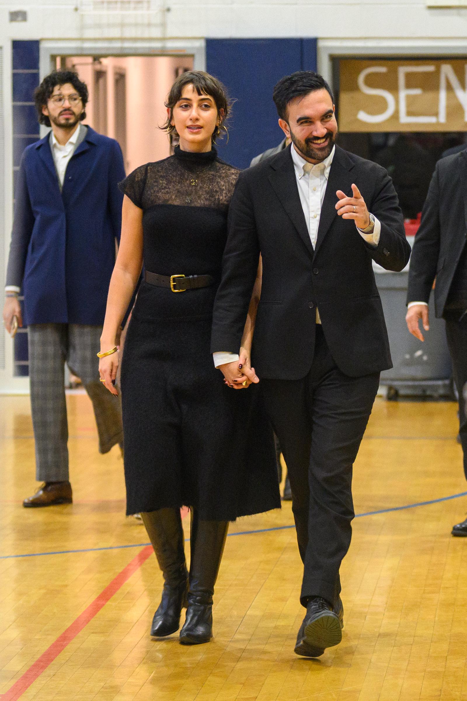 Rama Duwaji and Zohran Mamdani on their way to vote at The Frank Sinatra School of the Arts in the Queens borough of New York City on November 4, 2025. | Source: Getty Images