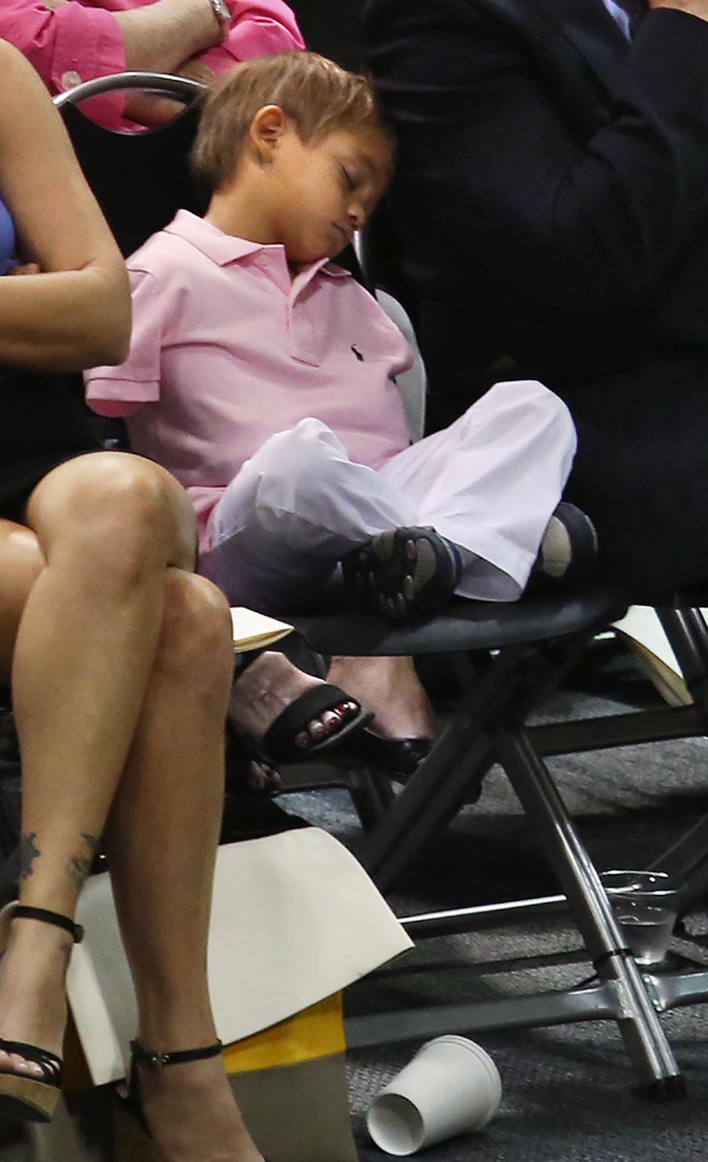 Charlie Woods snoozes during Elin Nordegren's commencement ceremonies at Rollins College on May 10, 2014, in Winter Park, Florida | Source: Getty Images