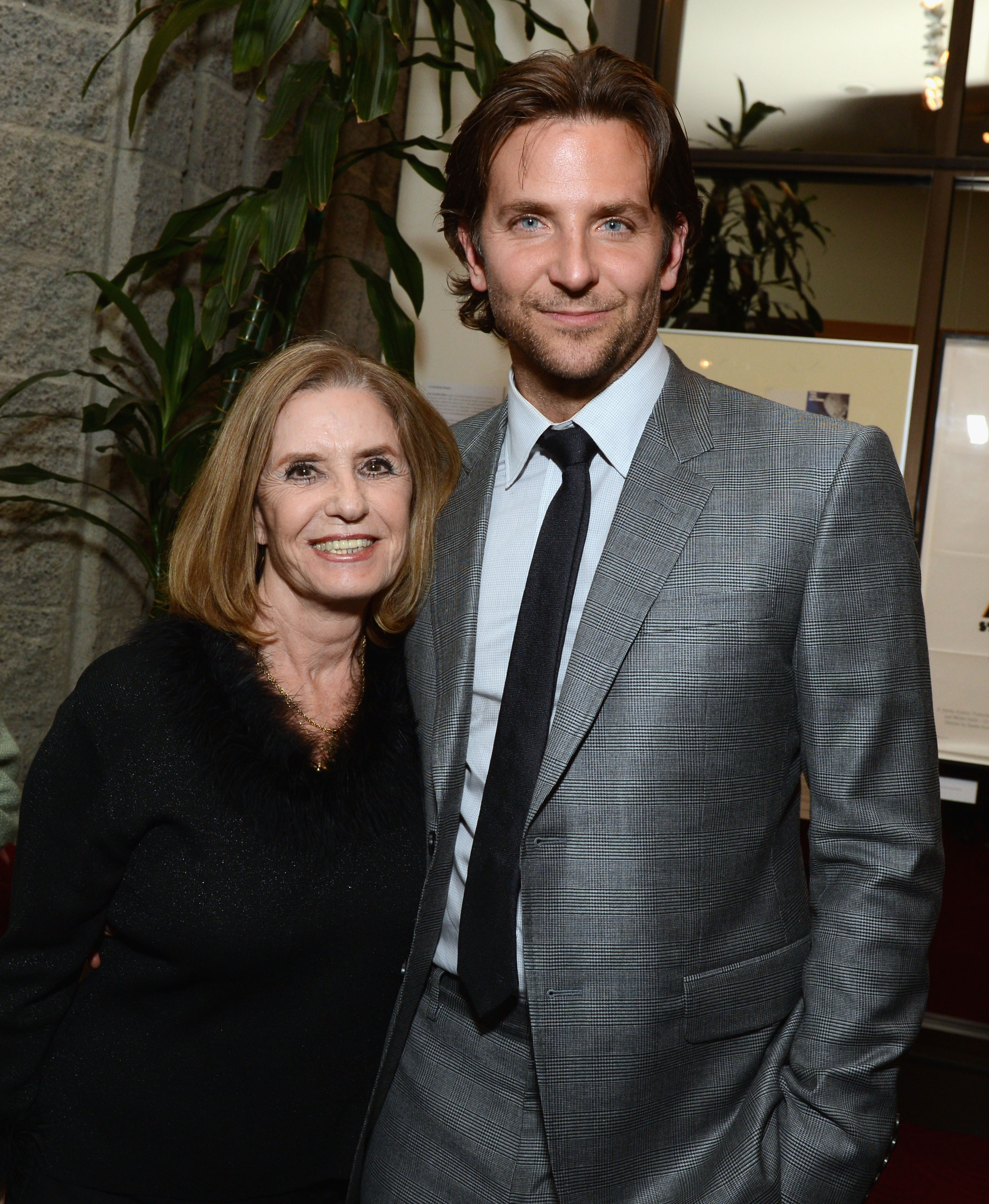 Cooper, 37, displayed a more mature appearance with visible stubble, slightly defined laugh lines around his eyes, and brown hair worn longer and parted on the side. He was seen next to Noemia Young during a special screening of "Silver Linings Playbook" after party presented by The Weinstein Company sponsored by Grey Goose and Lexus at AMPAS Samuel Goldwyn Theater on November 19, 2012, in Beverly Hills, California.