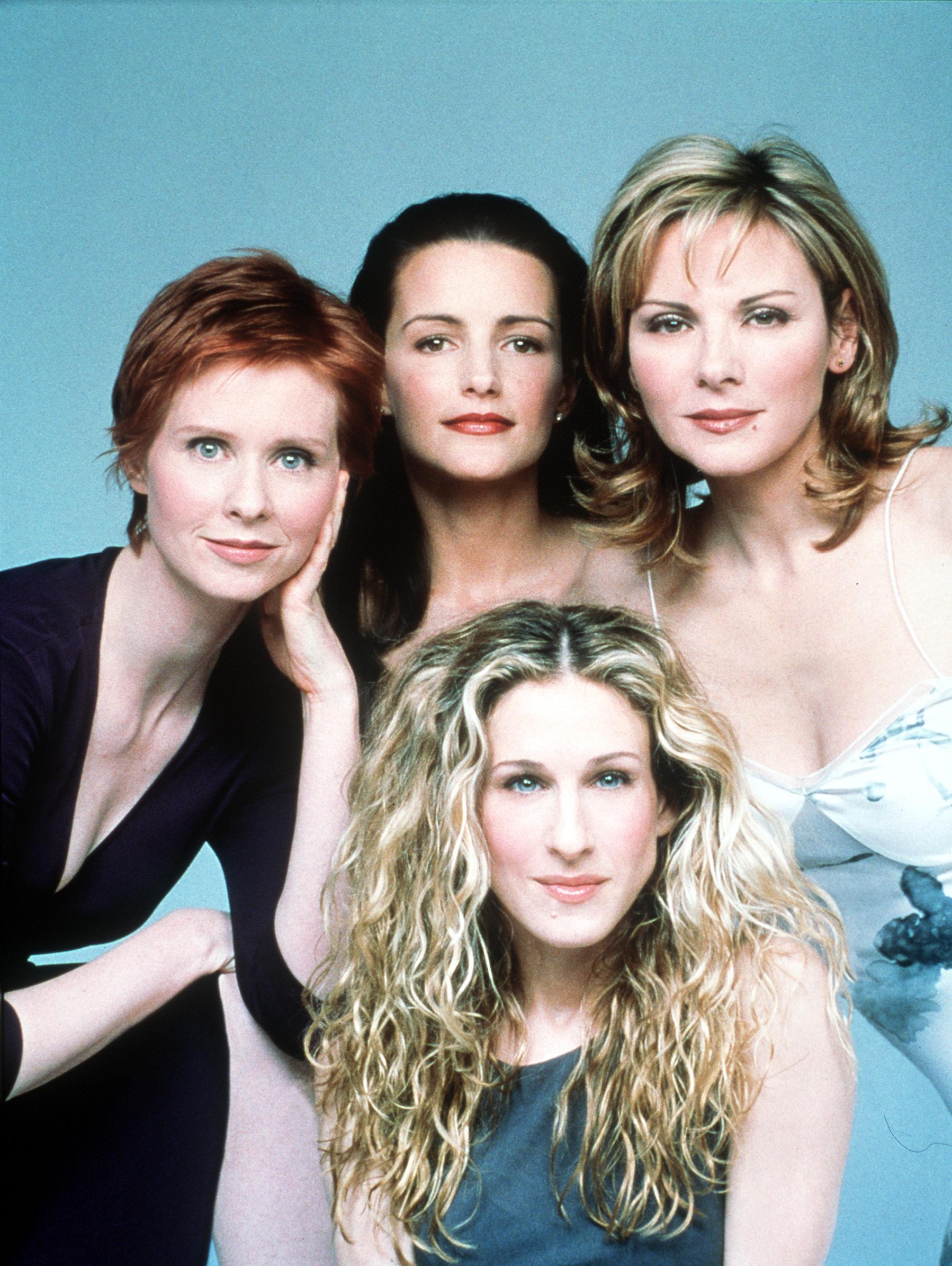Clockwise from top left: Cynthia Nixon, Kristin Davis, Kim Cattrall and Sarah Jessica Parker pose for a portrait for "Sex and the City" on November 10, 1999. | Source: Getty Images