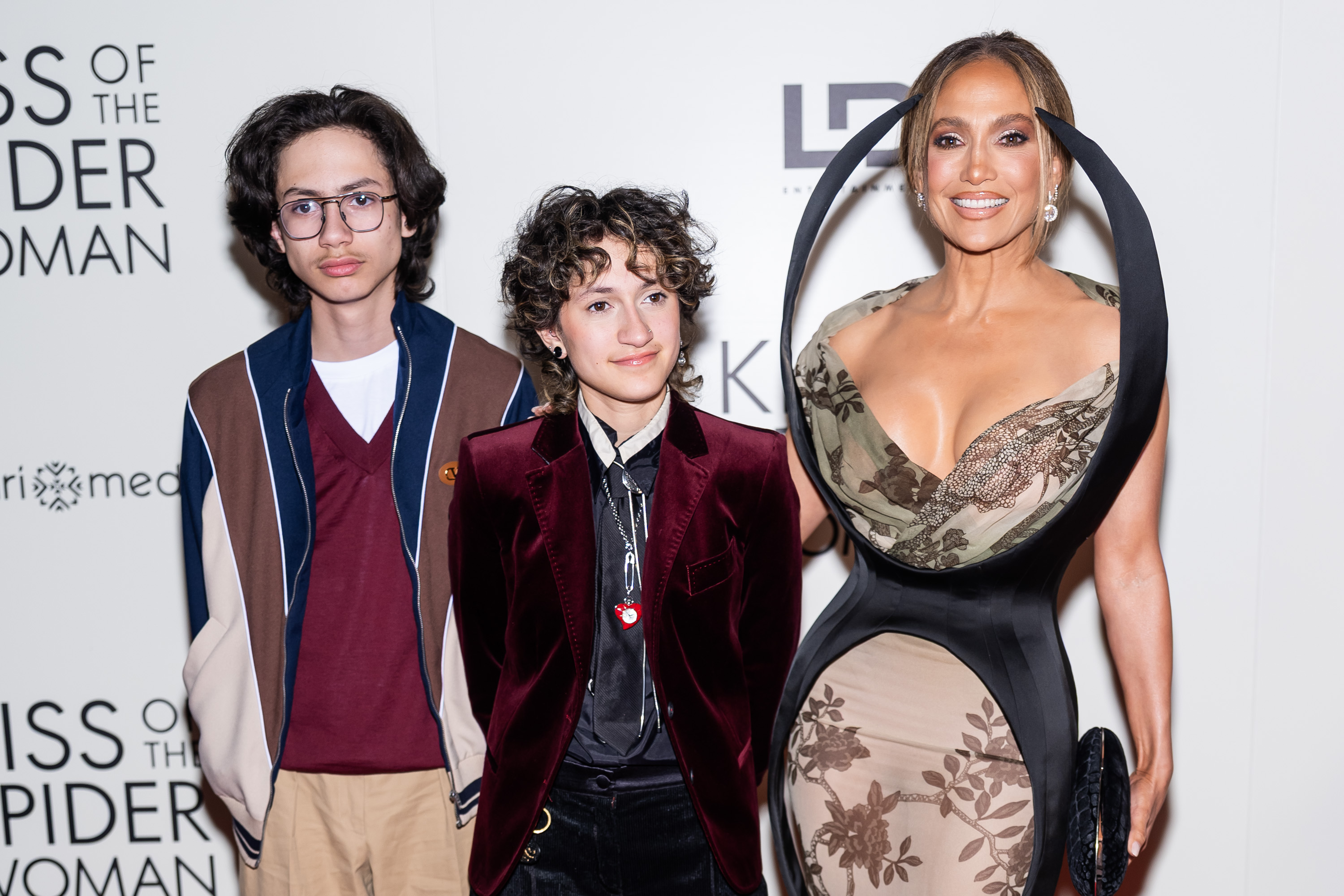Jennifer Lopez poses with twins Max and Emme at the New York screening of "Kiss of the Spider Woman" on Oct. 6, 2025. Jennifer recently shared that although becoming an empty nester is emotional, she is excited to watch her children begin the next chapter of their lives while knowing they will always have a home with her. | Source: Getty Images