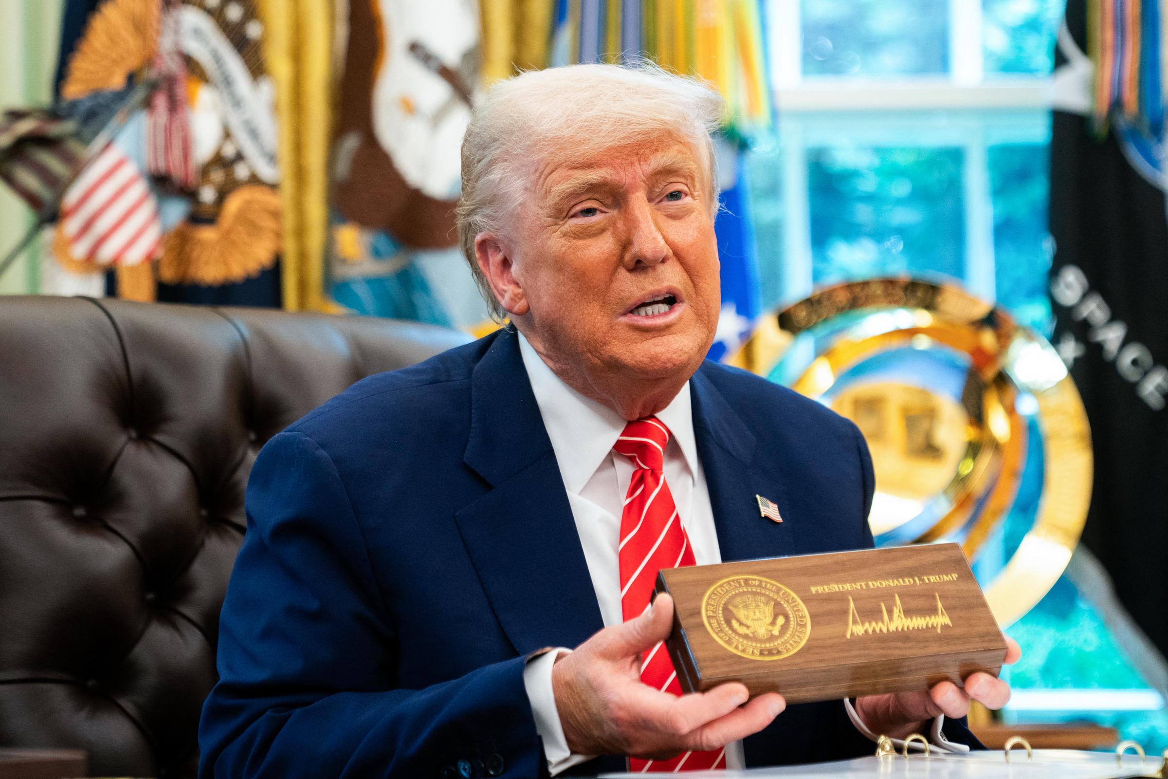 President Donald Trump in the Oval Office of the White House in Washington, DC, before presenting Elon Musk with a key to the White House, on May 30, 2025 | Source: Getty Images