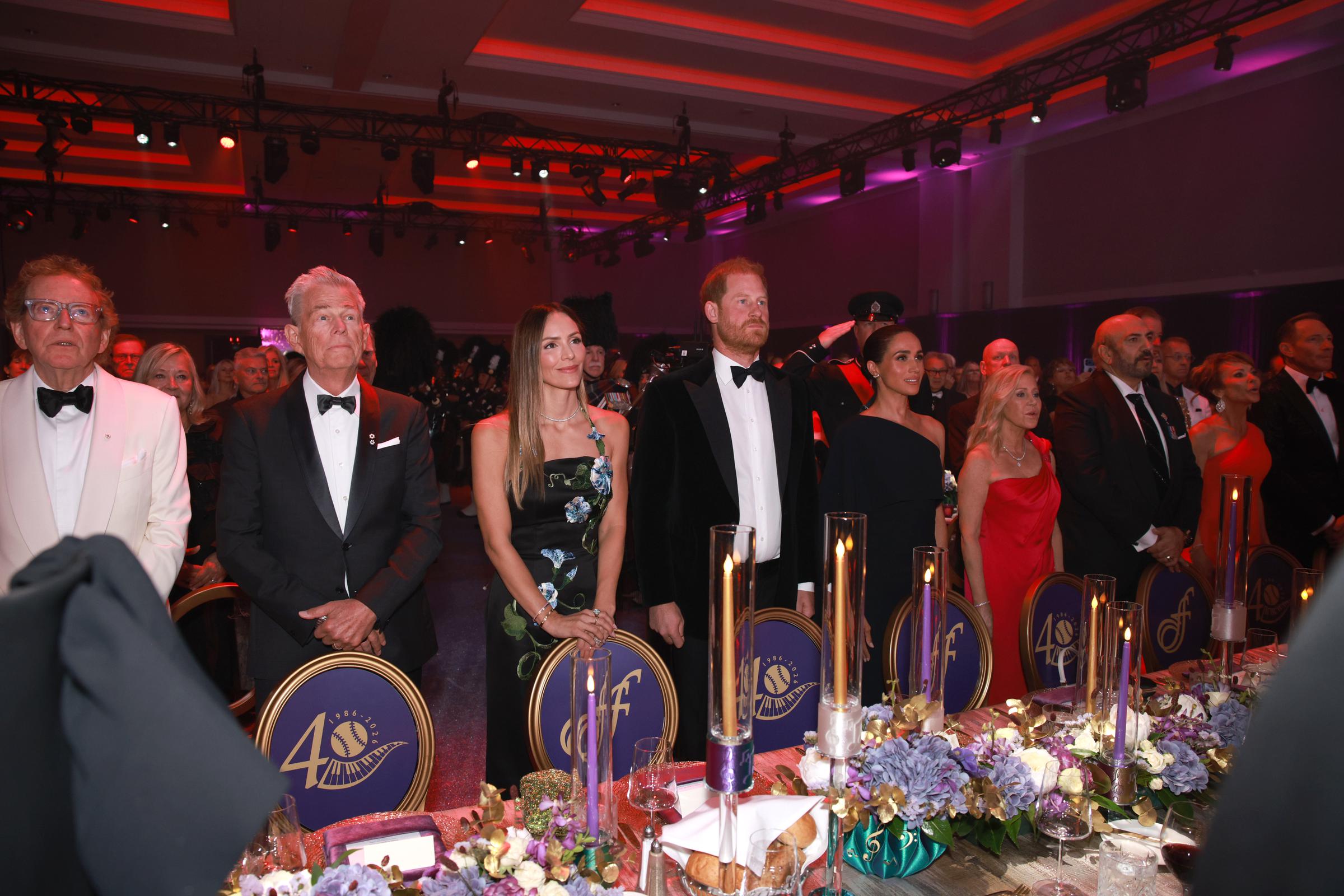 Some netizens did not believe she was snubbed at all during the star-studded gathering. In this photo, Anthony von Mandl, David Foster, Katharine McPhee, Prince Harry, Duke of Sussex, Meghan, Duchess of Sussex, Wendy Cocchia, and Sergio Cocchia attended the David Foster Foundation 40th Anniversary Celebration on August 7, 2026, in Victoria, British Columbia. | Source: Getty Images