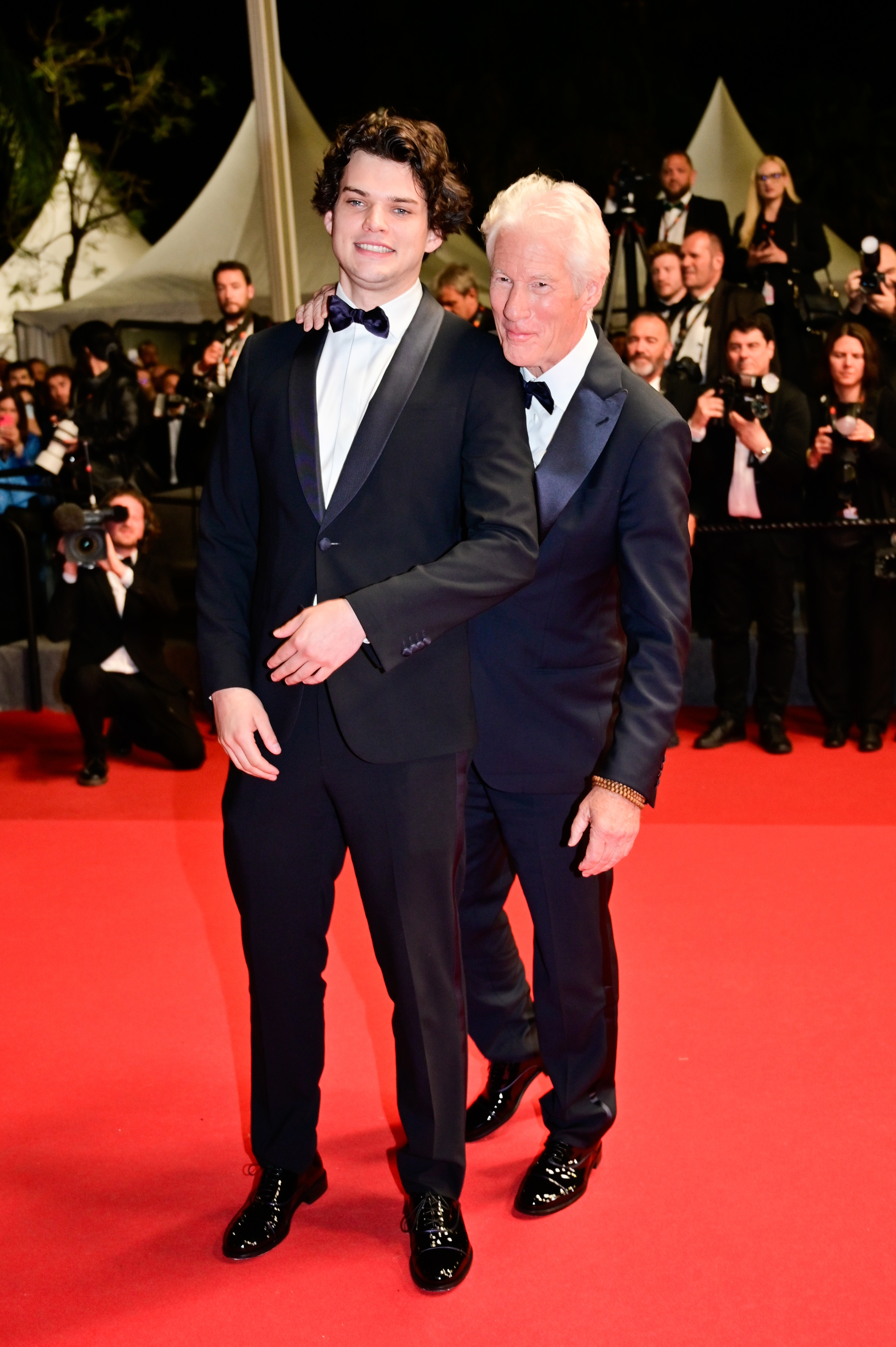 Though Homer Gere generally shies away from the limelight, he and his father made a rare public appearance together at the Cannes Film Festival in May 2024, walking the red carpet side by side. | Source: Getty Images