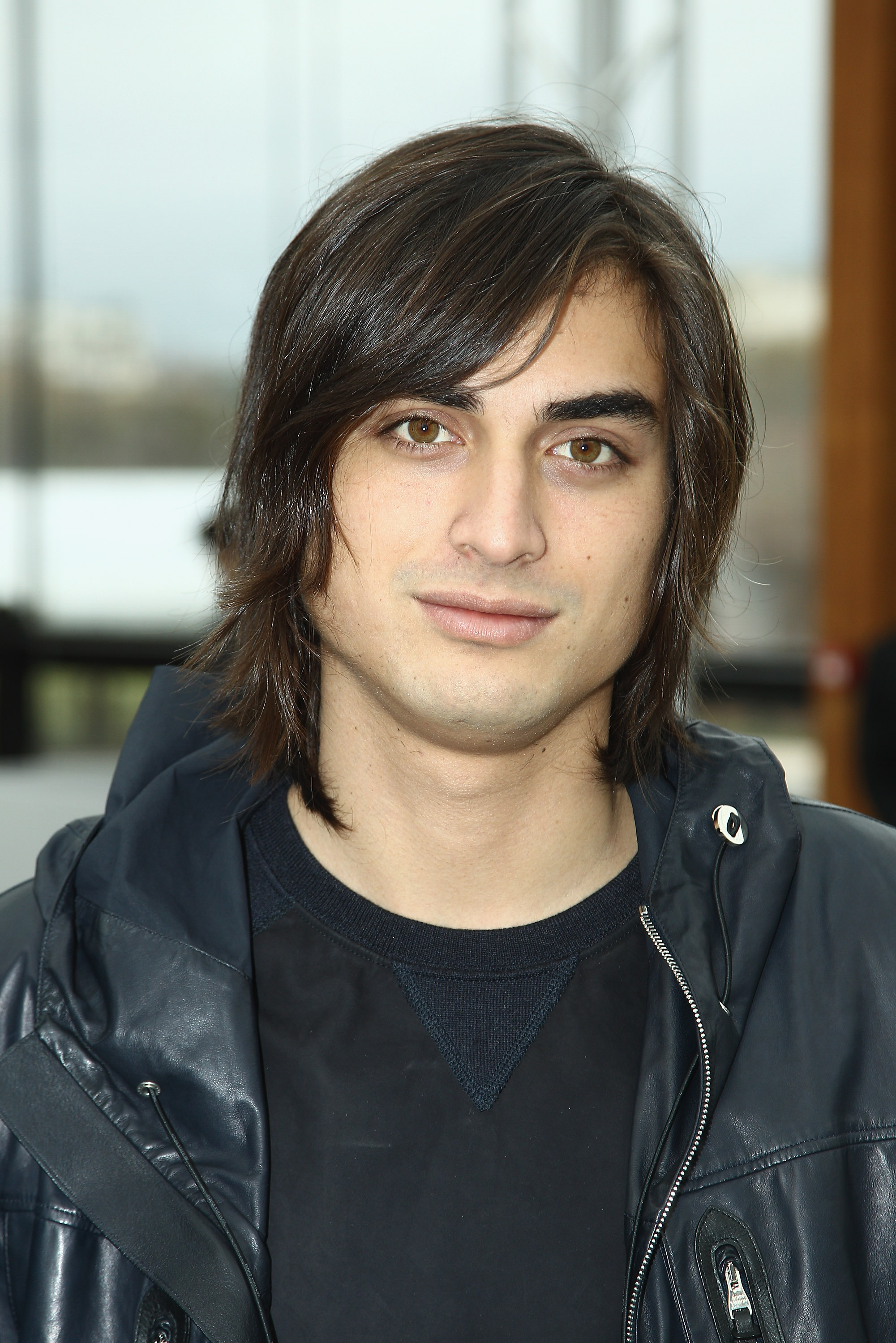 Tuki Brando arrives at the Louis Vuitton Menswear Autumn/Winter 2013 show during Paris Fashion Week in France on January 19, 2012. His modeling career gained momentum after photographer Bruce Weber introduced him to the fashion world, eventually leading to collaborations with several internationally recognized luxury brands.