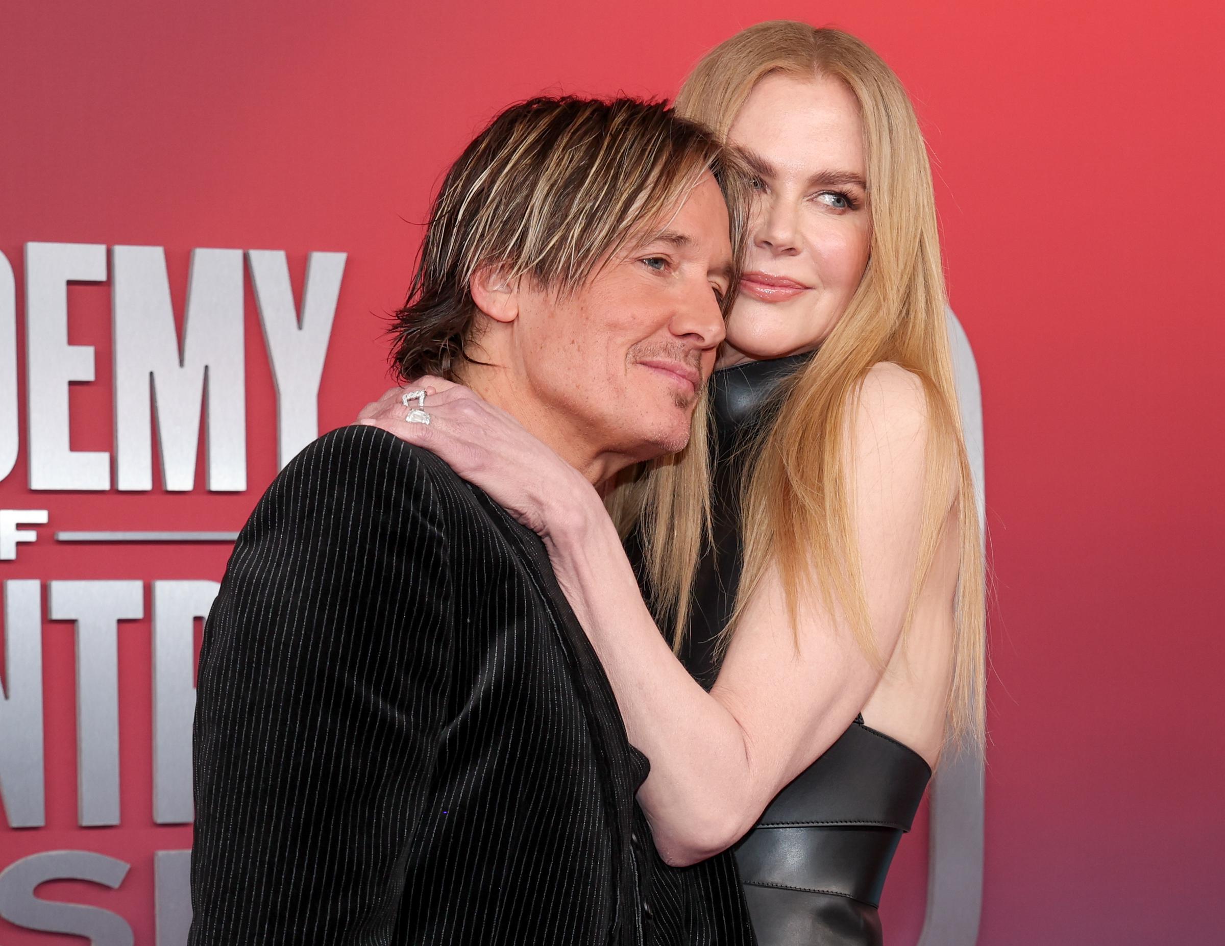 Keith Urban and his wife, Nicole Kidman are photographed in an intimate pose as they attend the at the 60th ACM Awards held at the Ford Center at The Star in Frisco, Texas on May 08, 2025 | Source: Getty Images