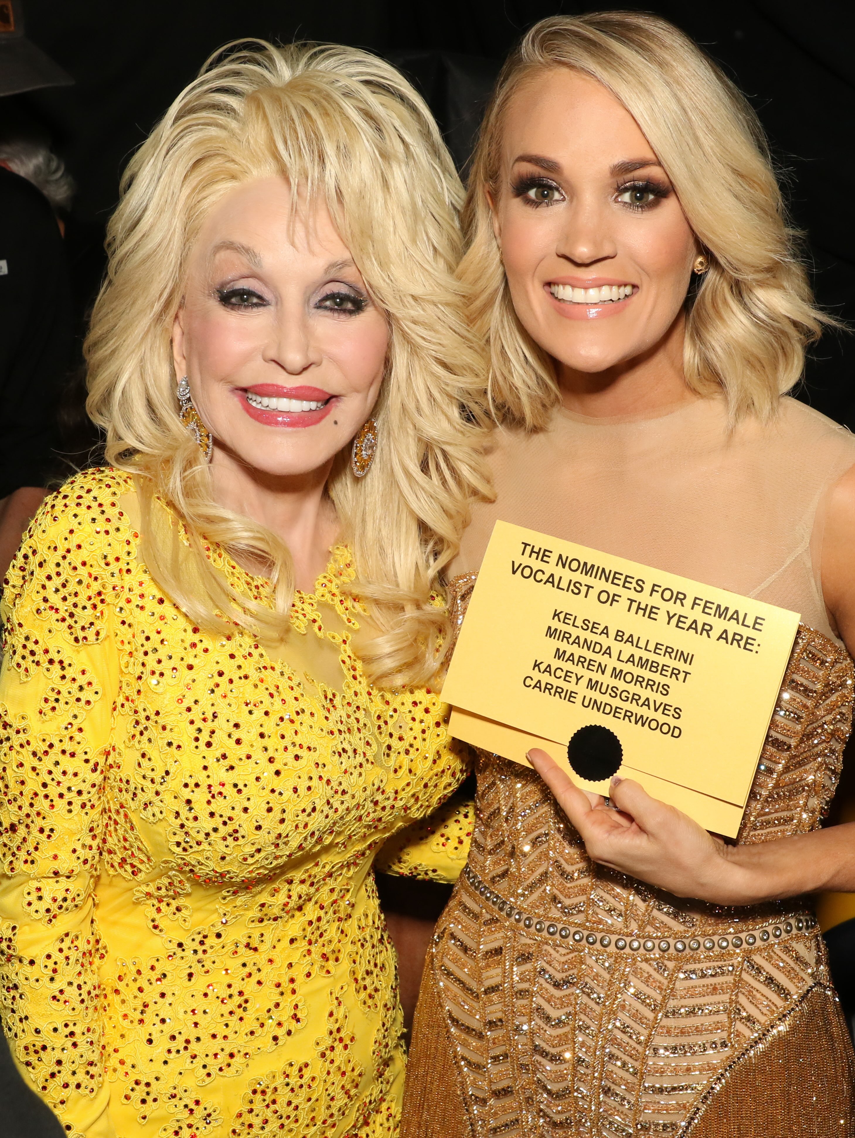 Award Show Support: Parton beams alongside Underwood, who proudly holds up a nominee card for Female Vocalist of the Year backstage. | Source: Instagram/carrieunderwood