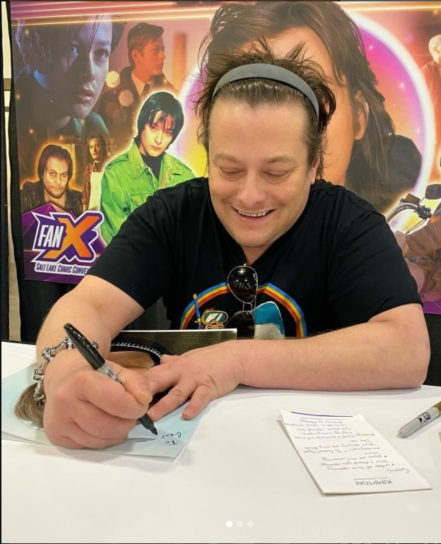 The actor signing an autograph | Source: Instagram/edwardfurlongofficial