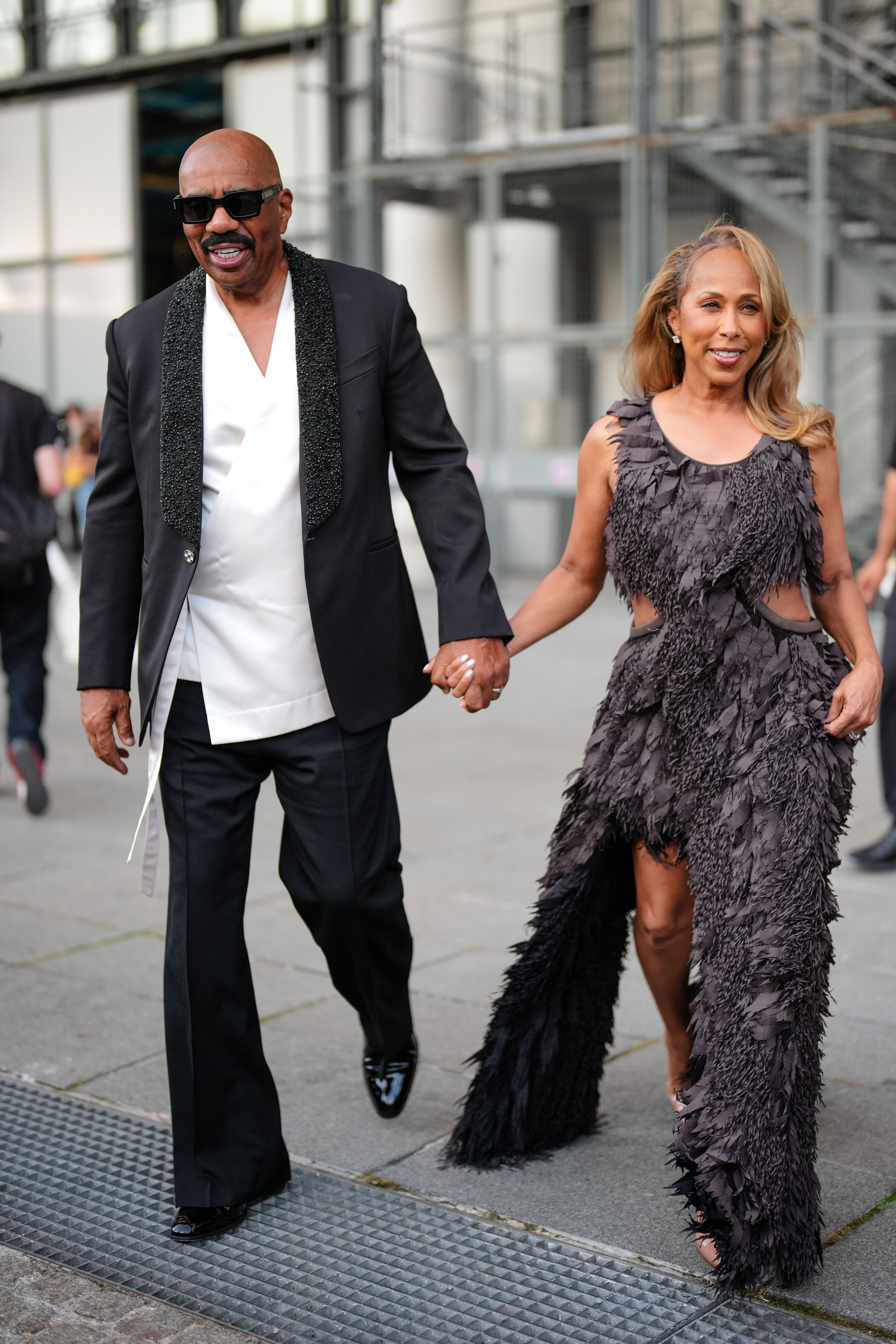 Majorie and Steve Harvey walk hand-in-hand as they are photographed in Paris, Franco on June 25, 2025 | Source: Getty Images