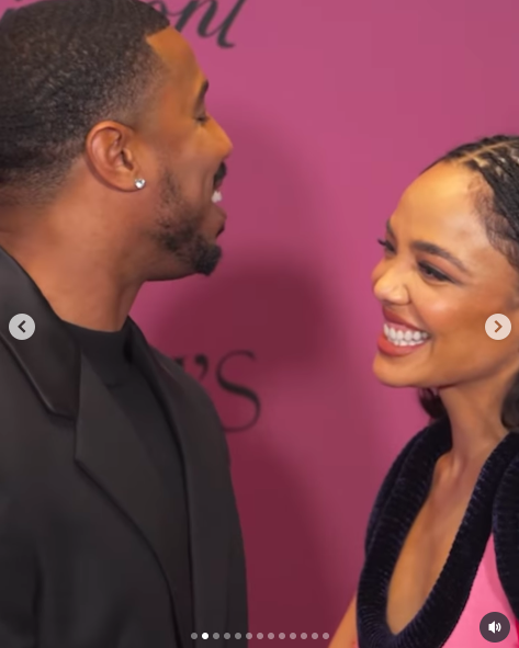Michael B. Jordan and Tessa Thompson sharing a laugh and a few words on the red carpet, posted on December 10, 2025. | Source: Instagram/people