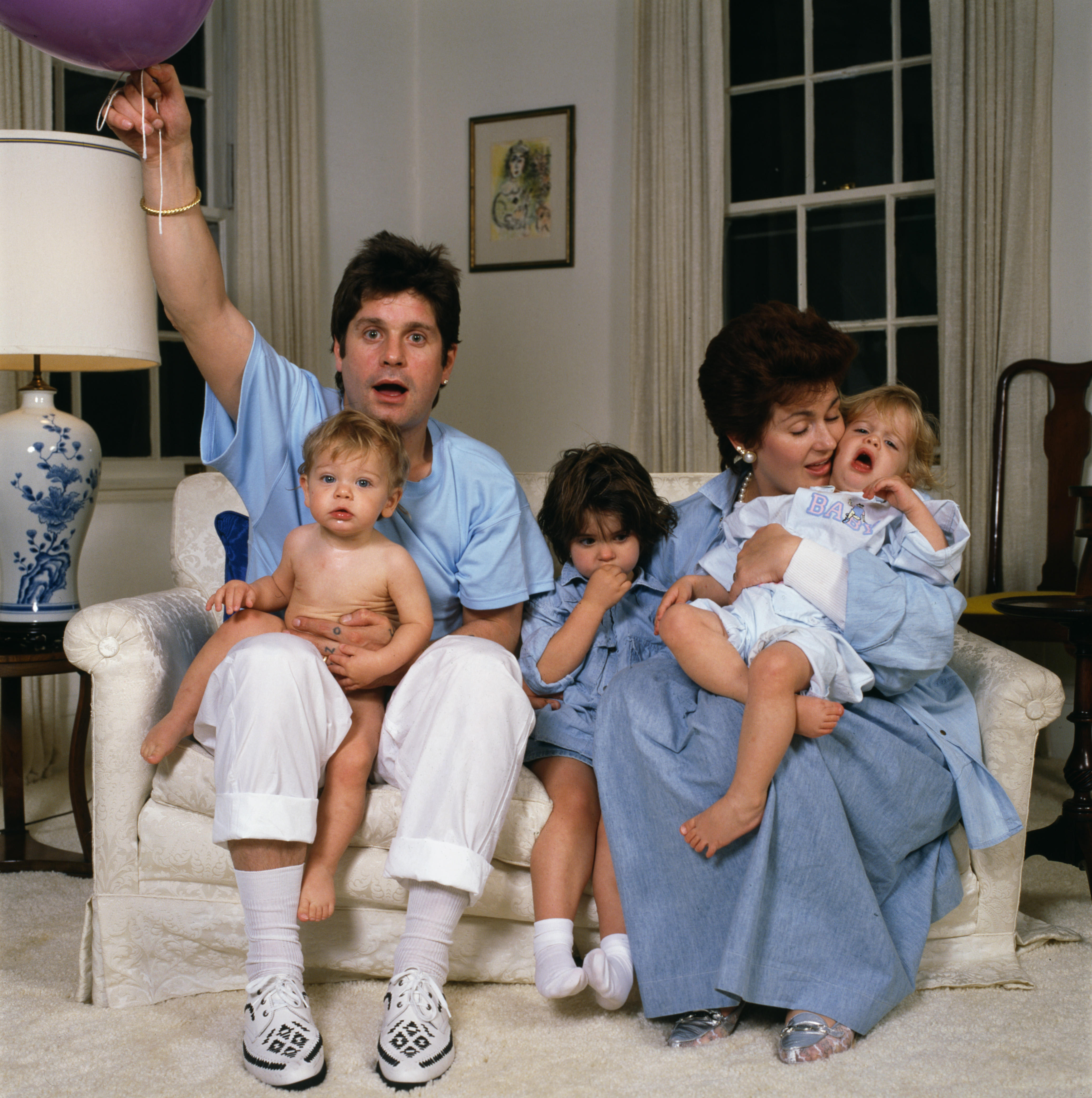 L-R: Jack, Ozzy, Aimee, Sharon and Kelly Osbourne in a family portrait at their home in Beverly Hills in 1987. | Source: Getty Images