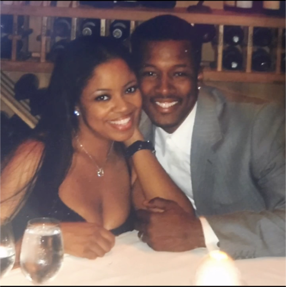 Shanice and Flex Alexander smiling warmly cozied up together at a table, posted on February 19, 2026. | Source: Instagram/flexaforeal