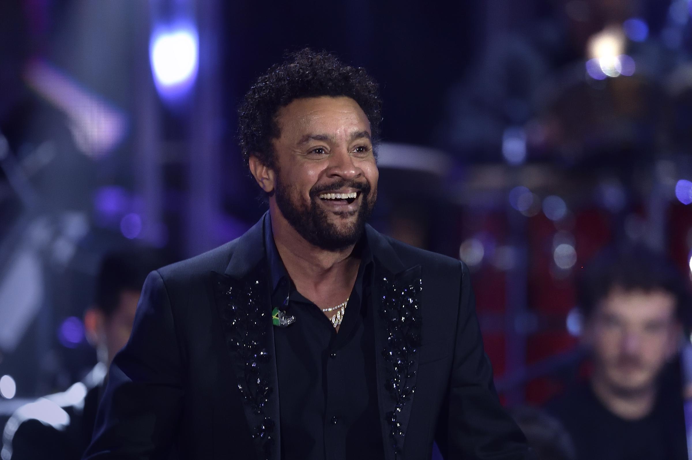 Shaggy smiles while appearing onstage during the Christmas Concert 2021 at Auditorium Conciliazione in Rome, Italy, on December 16, 2021 | Source: Getty Images