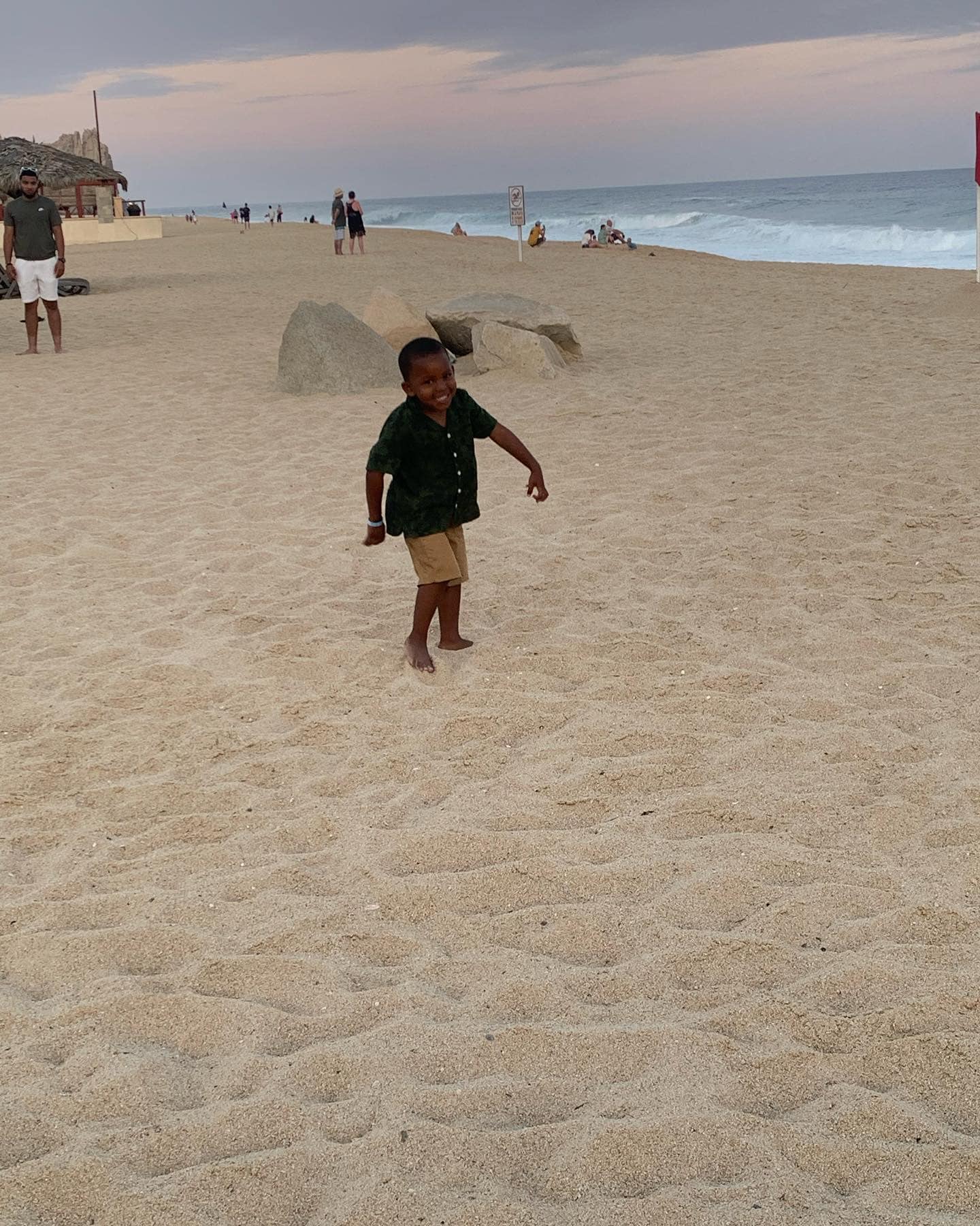 A photo of Nicholas Gray having fun on the beach, posted on August 11, 2022. | Source: Facebook/Kenzie Gray