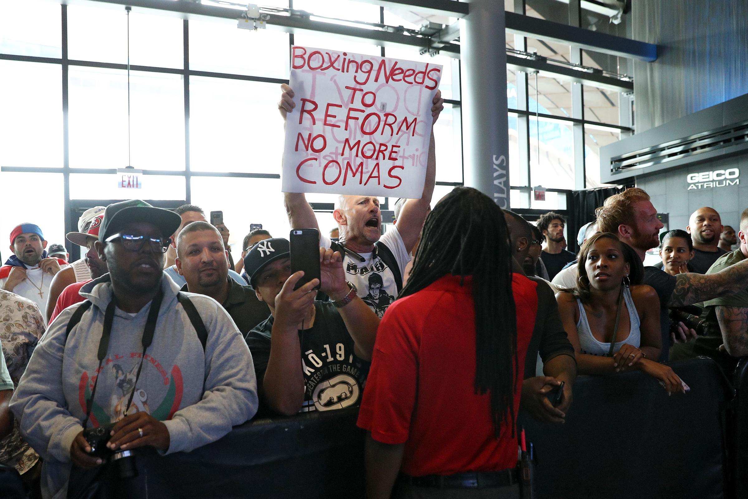 Richard also held a sign calling for reform in boxing and warning against future tragedies. He said his goal was to prevent other families from going through what his family had experienced. | Source: Getty Images