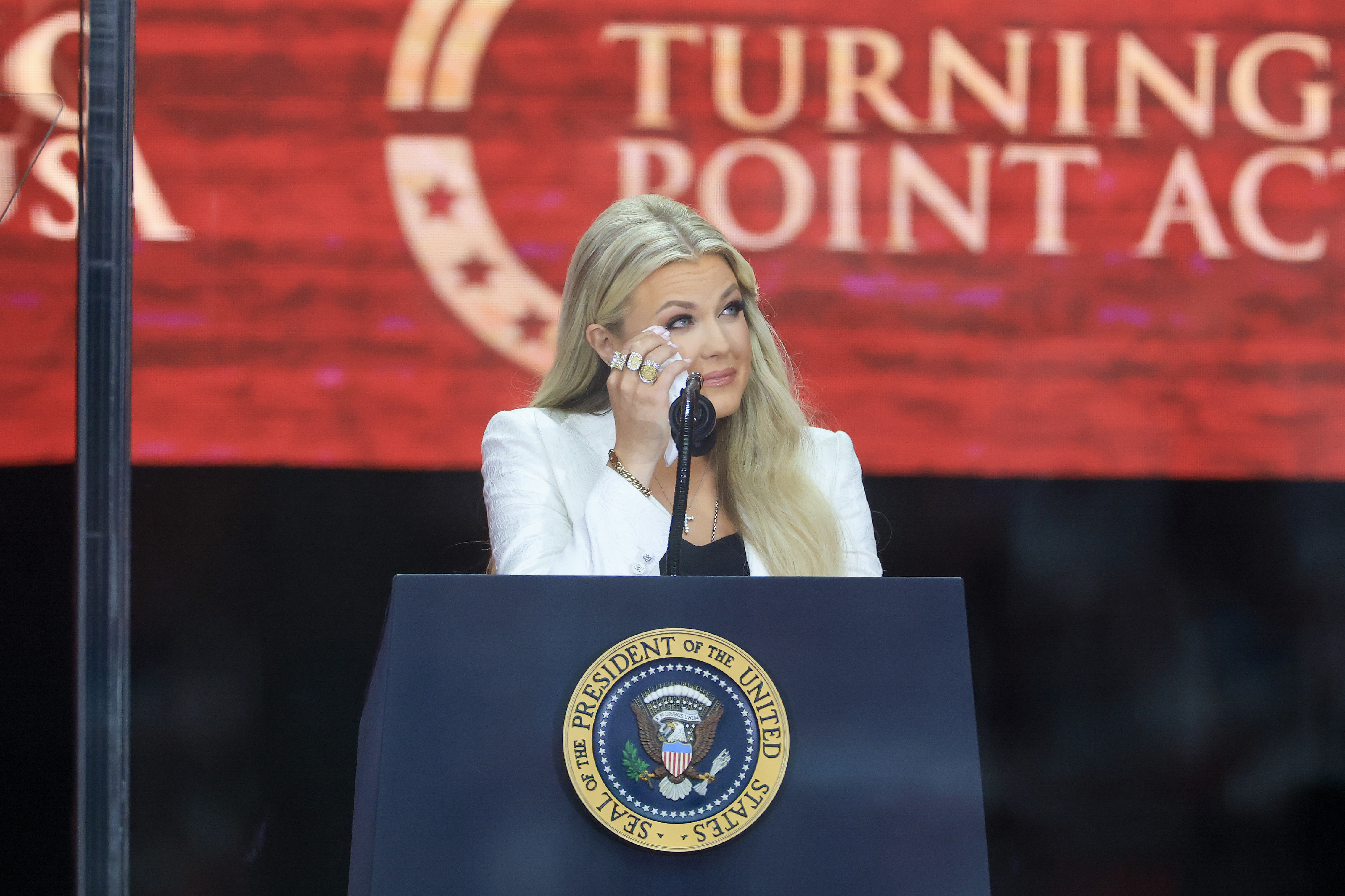 Erika Kirk speaks during the memorial service for her husband, political activist Charlie Kirk at State Farm Stadium on September 21, 2025, in Glendale, Arizona. | Source: Getty Images