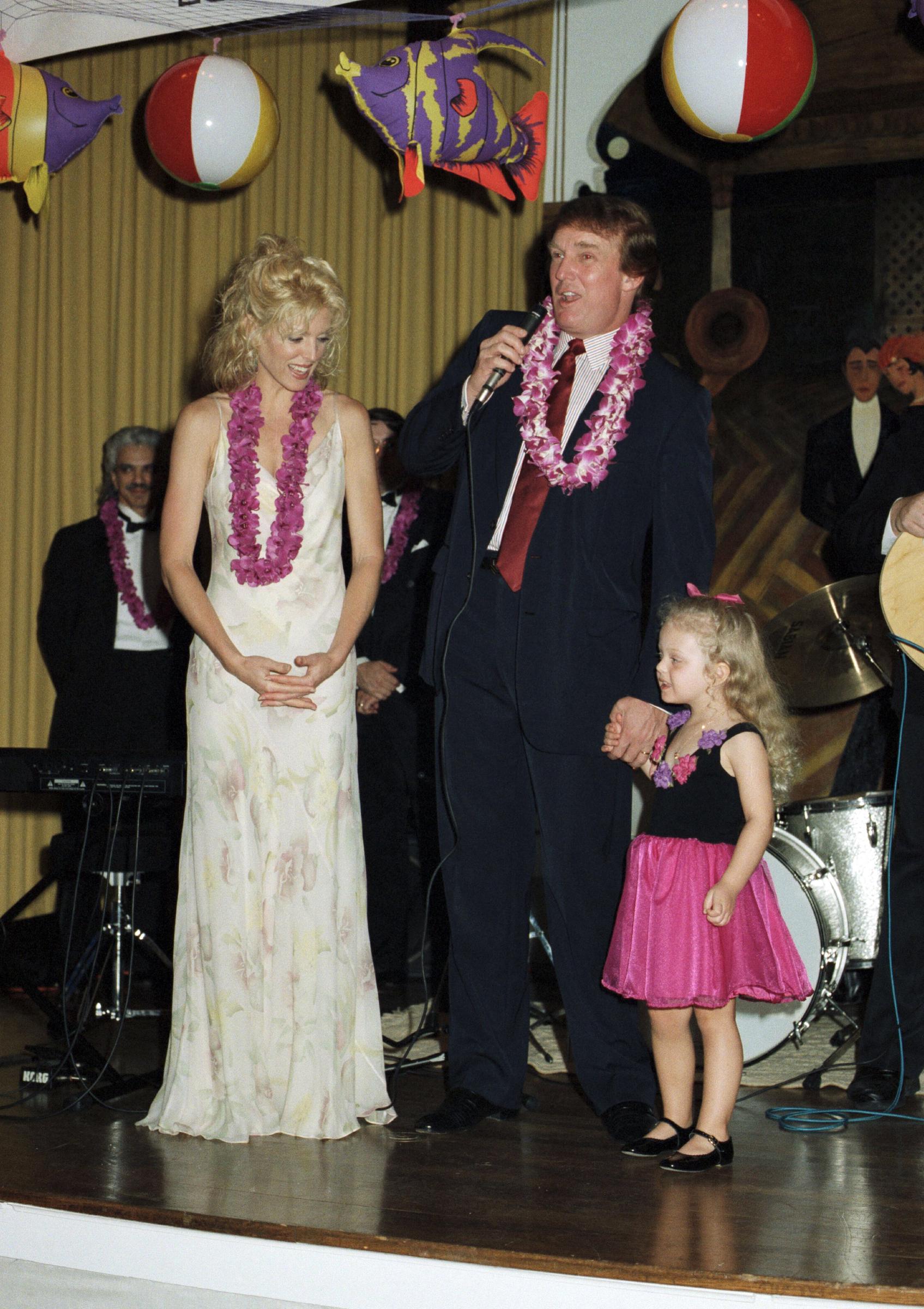 Donald Trump and Marla Maples still had a complicated relationship. In this photo, they stood on stage with their daughter Tiffany at Mar-a-Lago in Palm Beach, Florida, in 1997. | Source: Getty Images