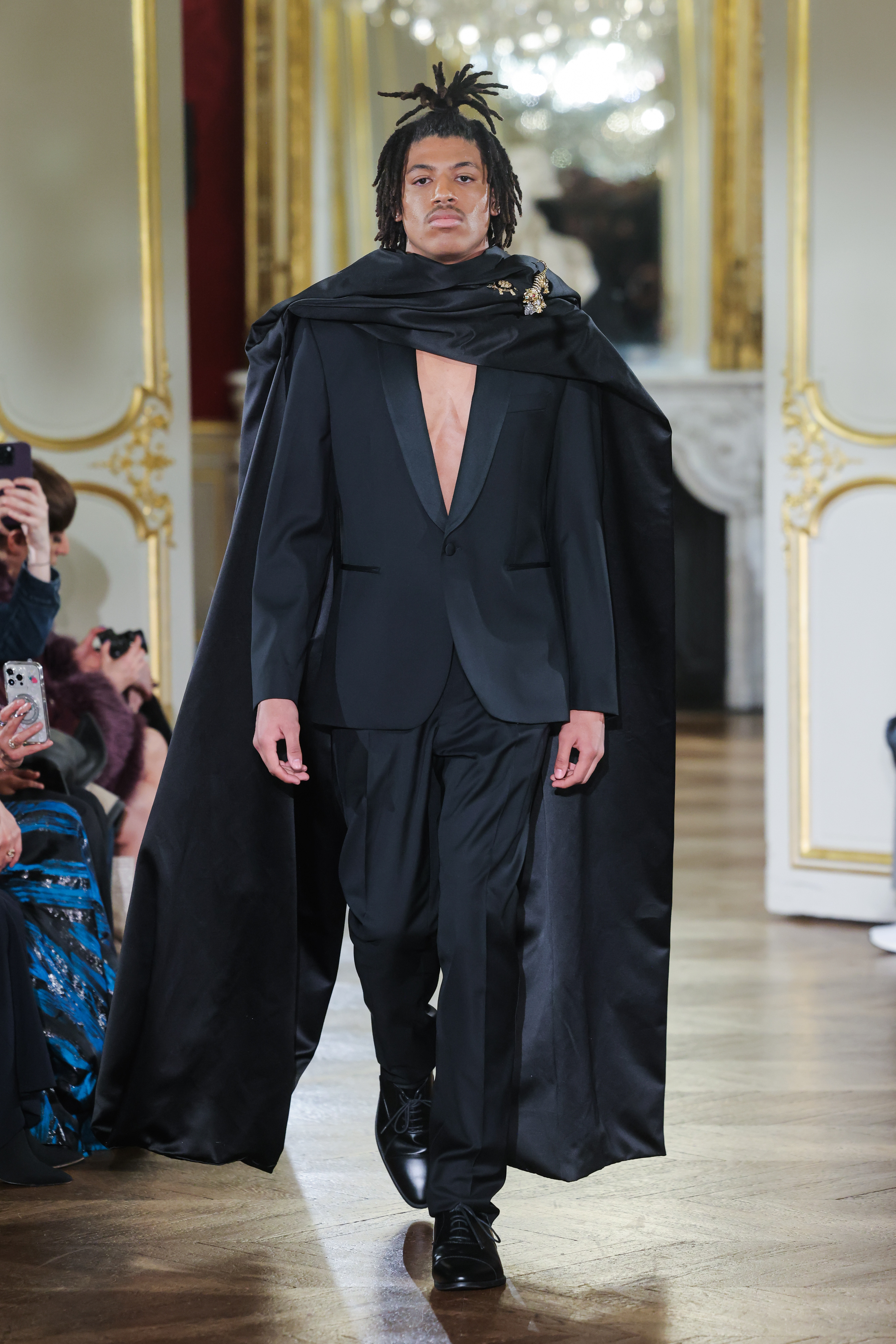 Henry Samuel walks the runway during the Lena Erziak Haute Couture Spring-Summer 2025 show as part of Paris Fashion Week at Hotel Le Marois on January 28, 2025, in Paris, France. | Source: Getty Images