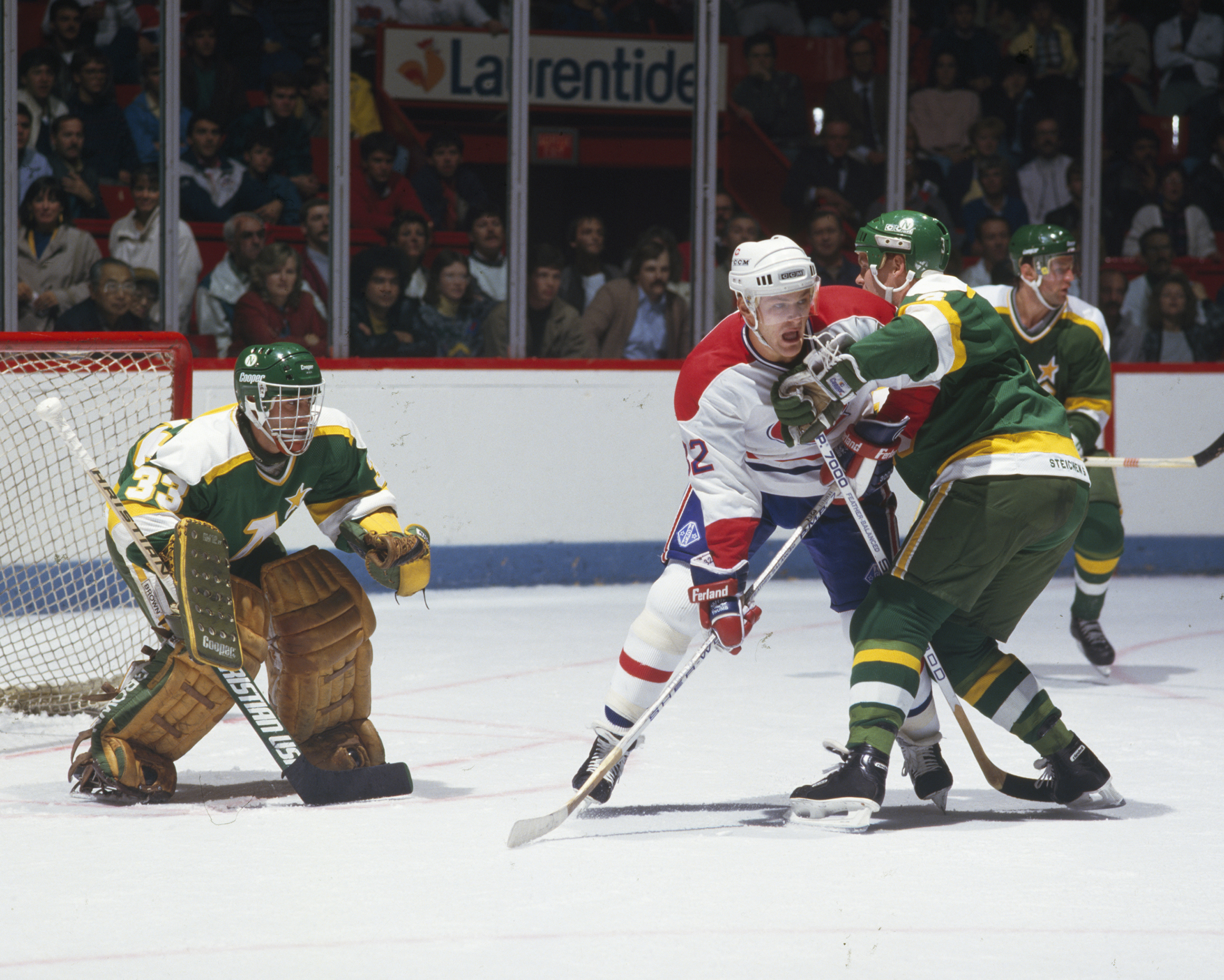 Claude Lemieux #32 of the Montreal Canadiens fights for position in front of the net against the Minnesota North Stars at the Montreal Forum in Montreal, Quebec, Canada, Circa 1980 . | Source: Getty Images