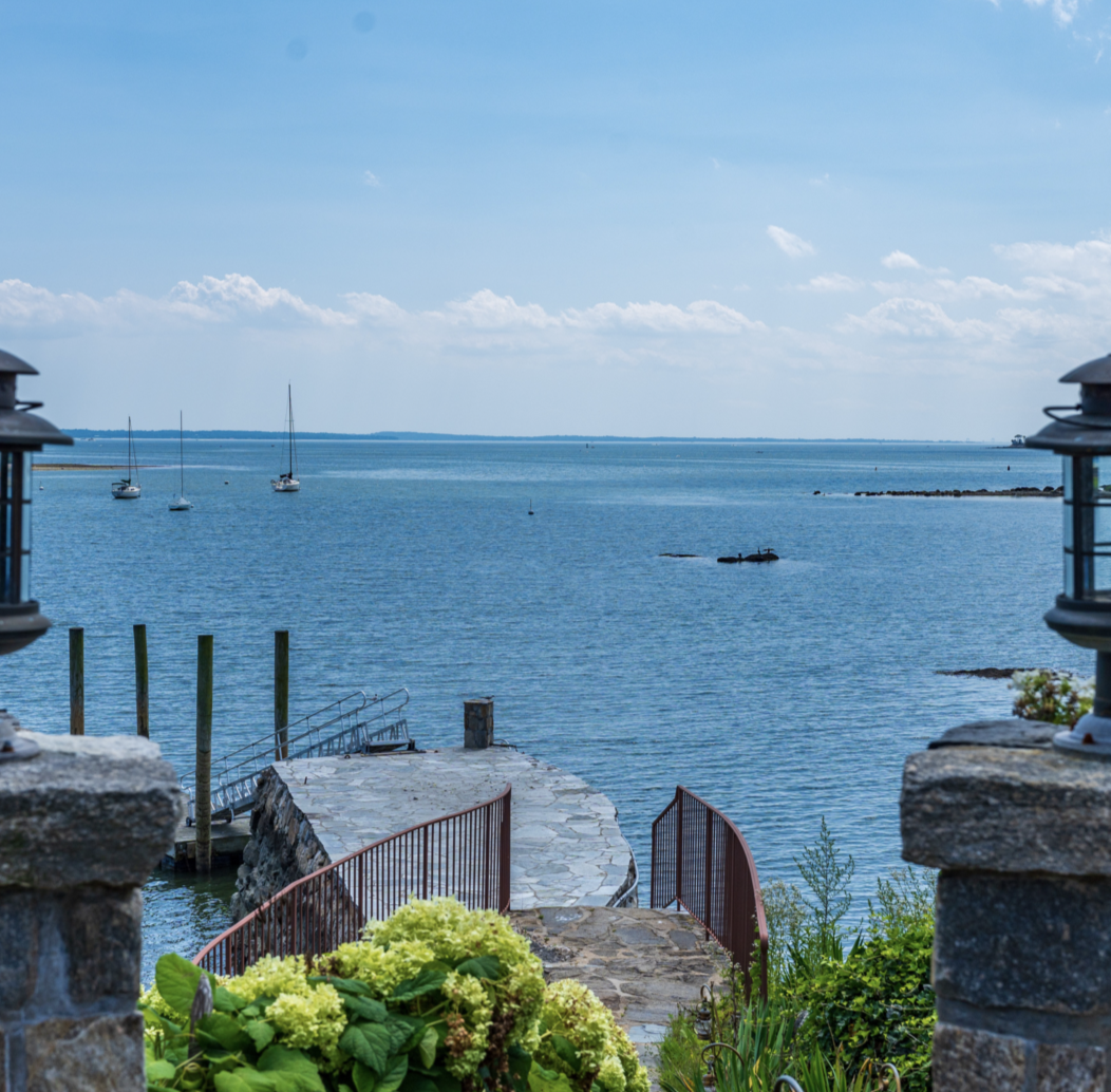 A stone pathway leads to Cedar Cliff's private dock, where sailboats dot the waters of Long Island Sound. The peaceful waterfront setting offered Kathie Lee and her family a beautiful place to enjoy life away from the spotlight. | Source: Instagram/ @brizolisjanzen