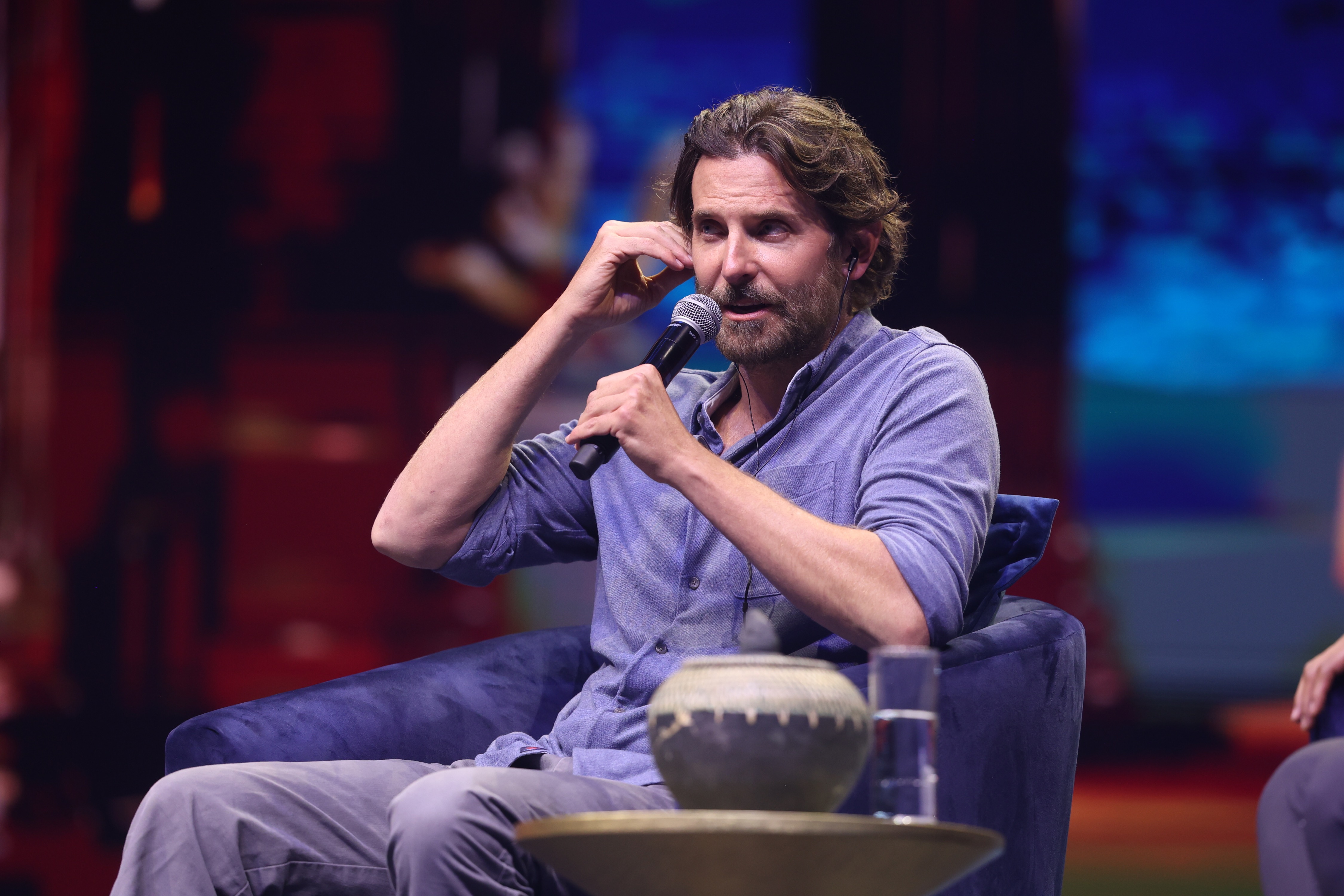 Cooper exhibited a casual appearance while speaking during his conference at the 'Mexico Siglo XXI 2024' event by Fundacion Telmex at Auditorio Nacional on September 6, 2024, in Mexico City, Mexico. He showed the fine lines around his eyes, a full salt-and-pepper beard, and longer, wavy brown hair swept back from his face.