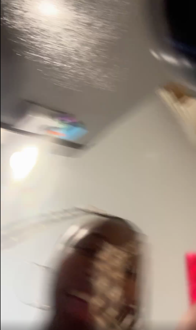 Zaria Carr taking Shamarcus Carr's phone and laughing on his livestream from June 14, 2025 | Source: Facebook/Thè Frenchman