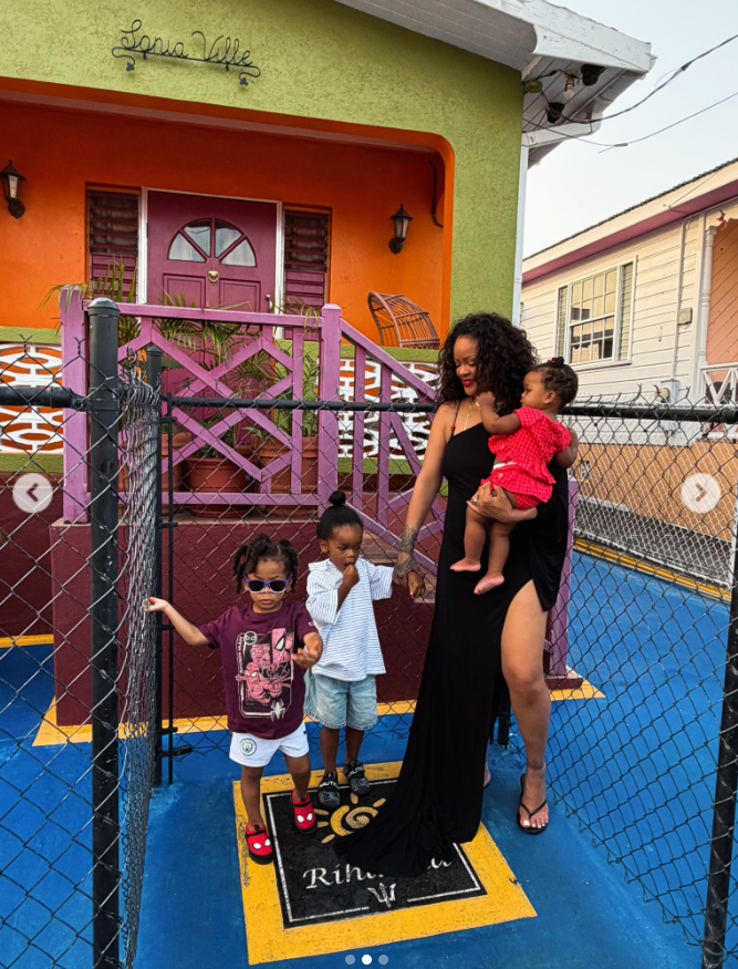 Rihanna poses with her three children outside her childhood home in Barbados, with RZA and Riot dressed casually alongside their younger sister, Rocki. | Source: Instagram/badgalriri