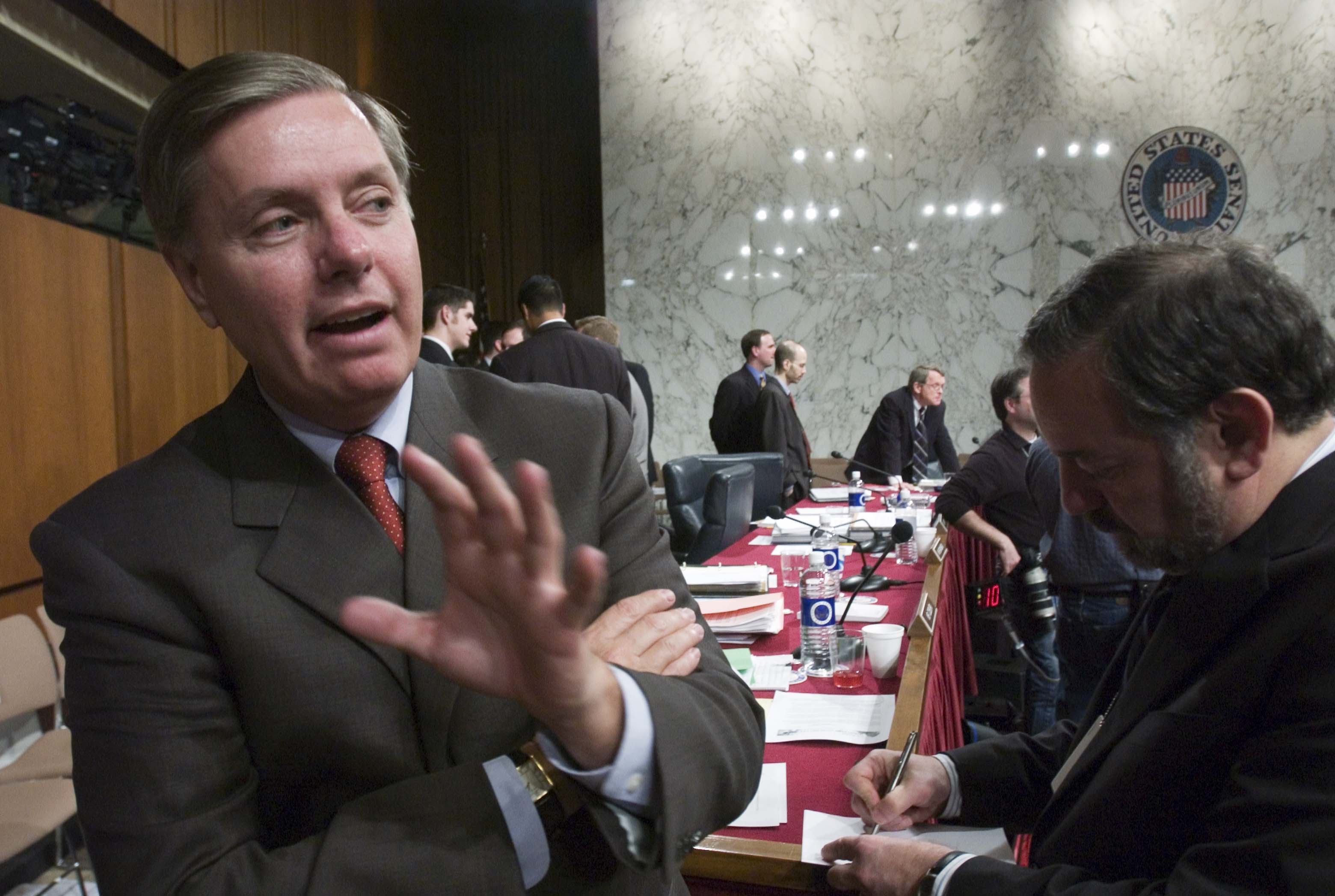 Lindsey Graham speaks with reporters during a break in a Senate Judiciary Committee confirmation hearing, reflecting the prominent role he played in some of Washington's most closely watched judicial battles. The moment captures him as one of the Senate's most recognizable Republican voices on legal and constitutional issues. | Source: Getty Images